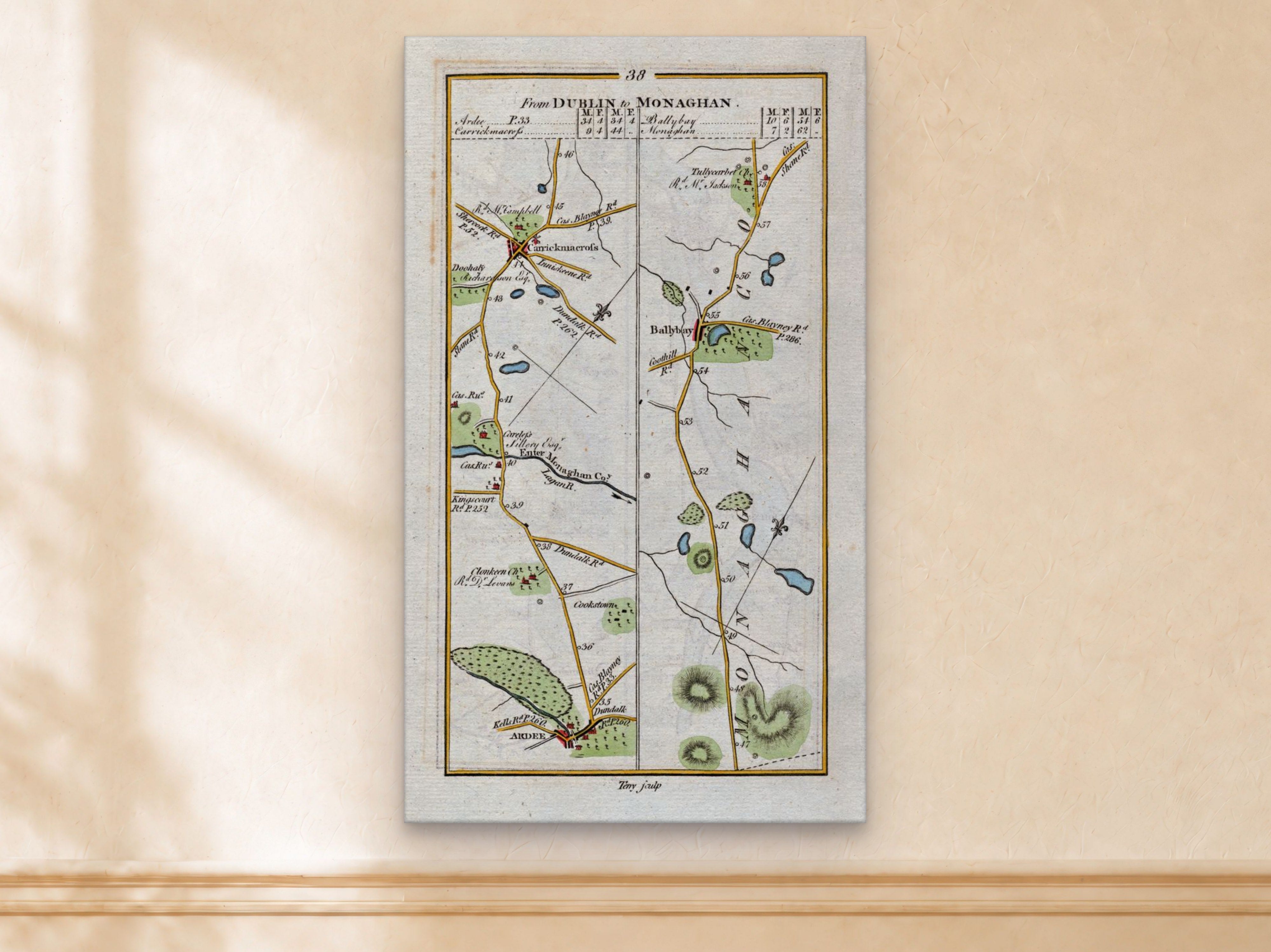 1783 Taylor & Skinner Ardee, Carrickmacross, Ballybay and Monaghan, Louth Ireland road map displayed on a light cream wall. The map covers Counties Monaghan and Louth.