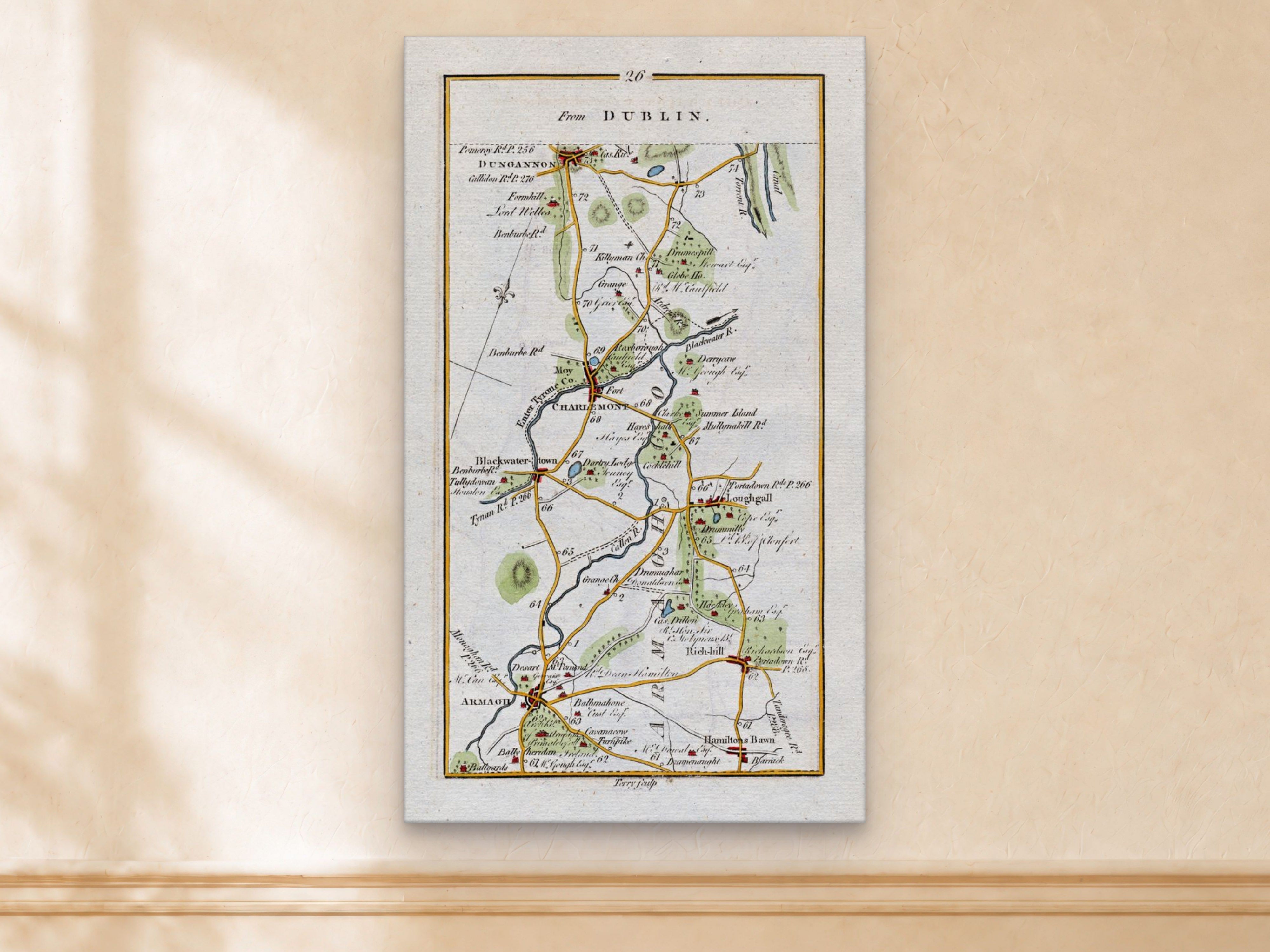 1783 Taylor & Skinner Armagh, Richhill, Loughgall, Charlemont and Dungannon Ireland road map displayed on a light cream wall.