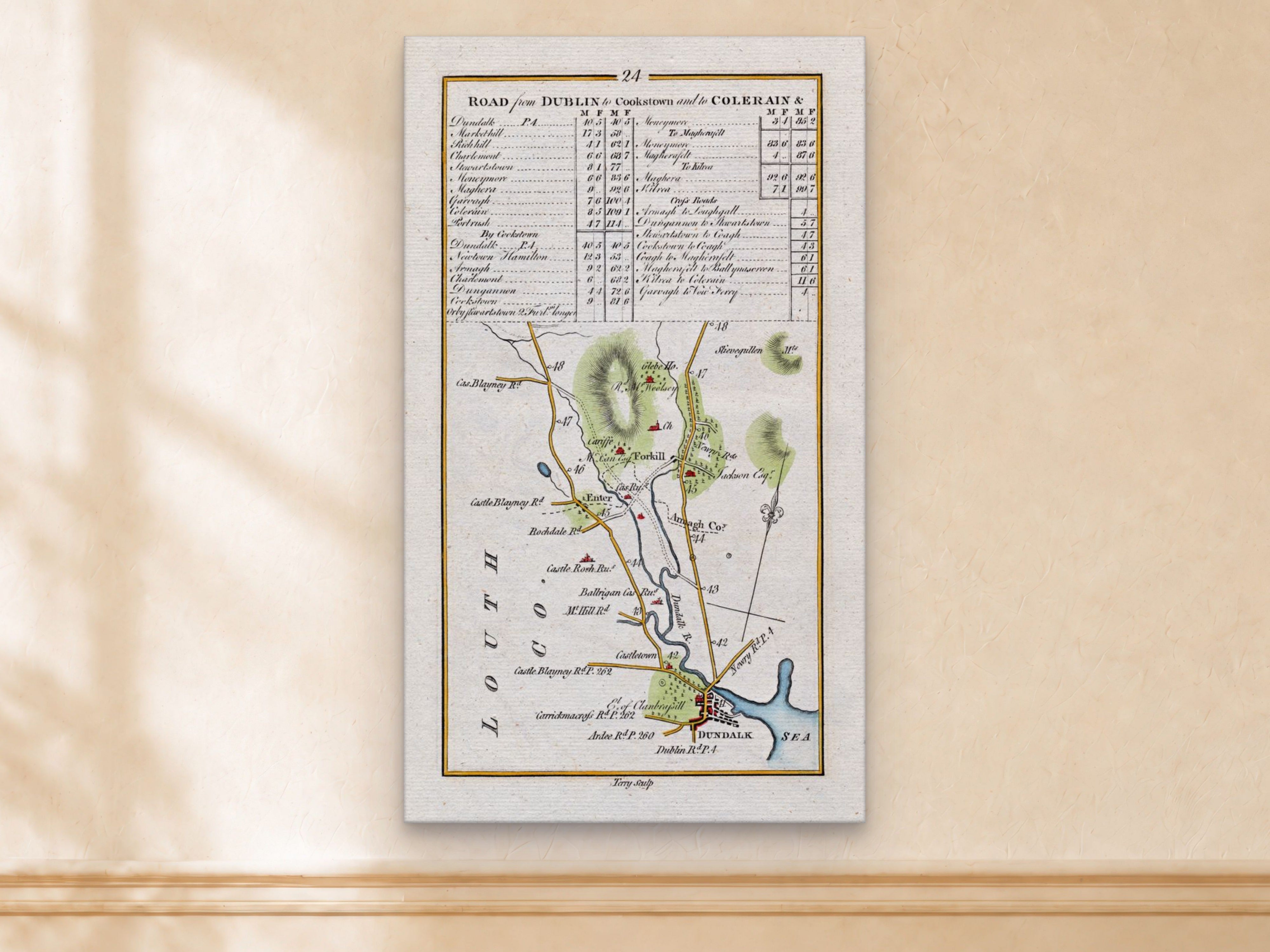 1783 Taylor & Skinner Dundalk, Forkhill, Castletown, Castle Roche and Castleblayney Ireland road map displayed on a light cream wall.