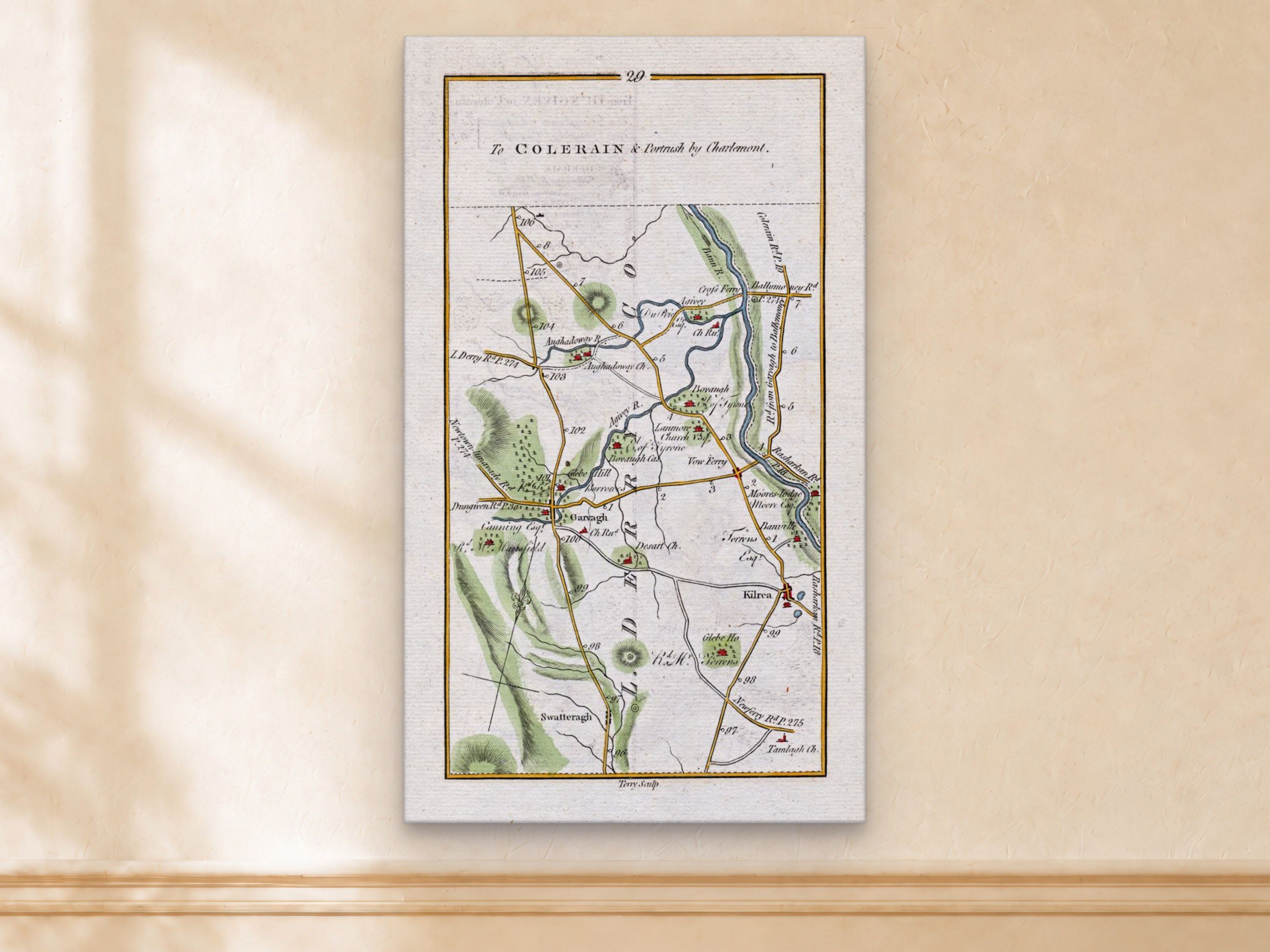 1783 Taylor & Skinner Garvagh, Kilrea, Aghadowey, Swatragh and River Bann Ireland road map displayed on a light cream wall.