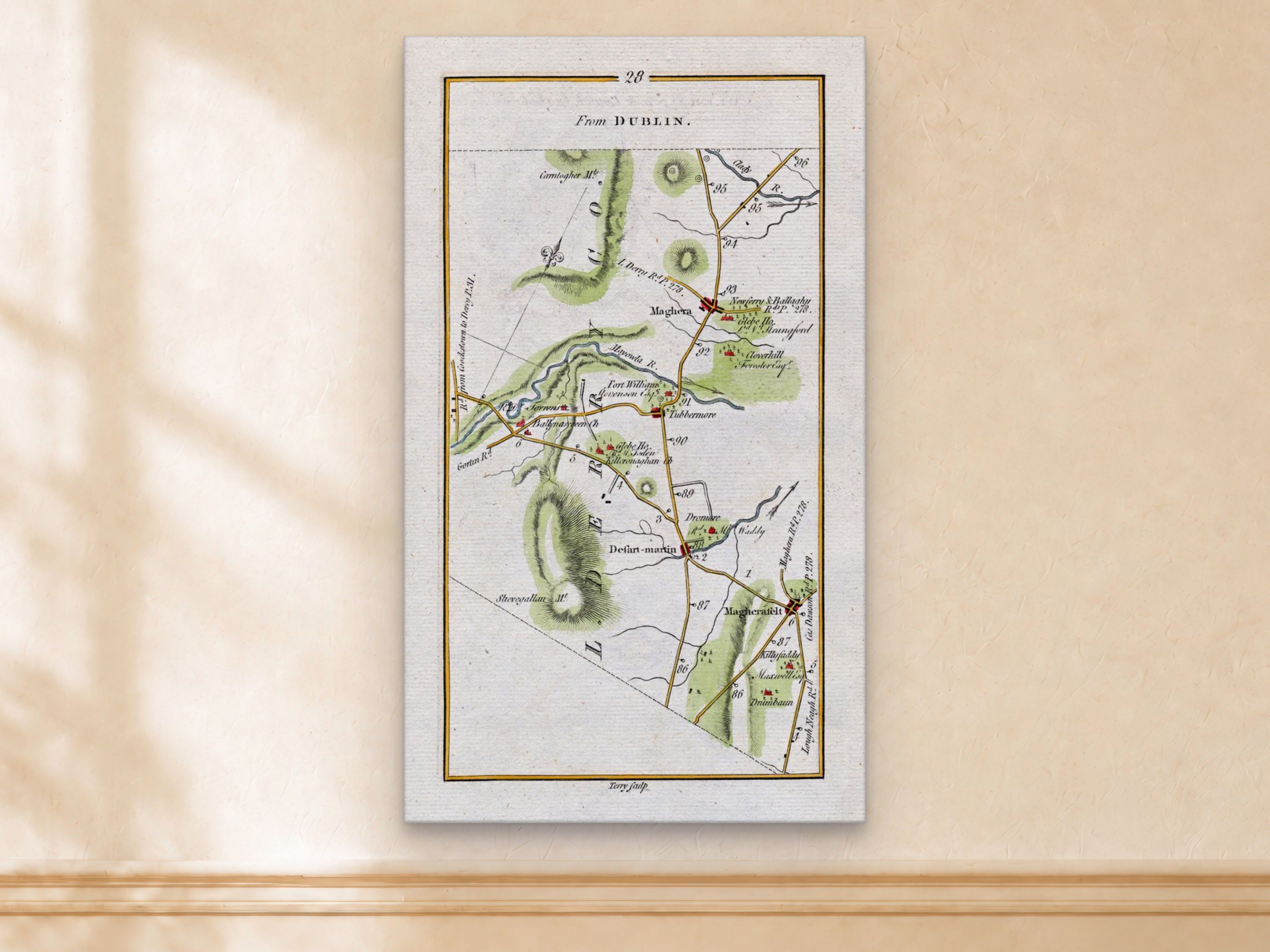 1783 Taylor & Skinner Maghera, Magherafelt, Tobermore, Desertmartin and Ballynascreen Ireland road map displayed on a light cream wall.