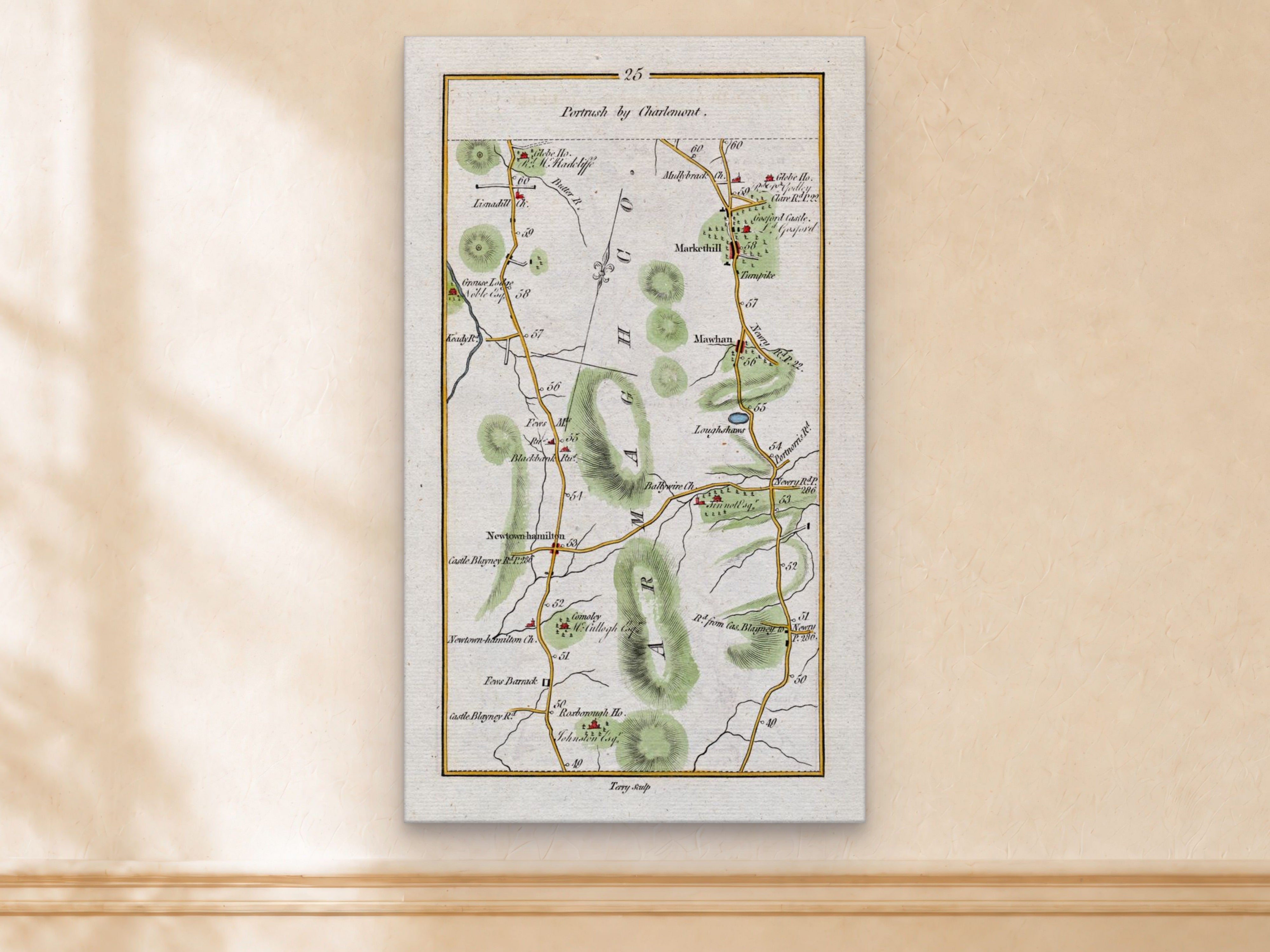 1783 Taylor & Skinner Markethill, Newtownhamilton, Mullabrack and Gosford Castle Ireland road map displayed on a light cream wall.