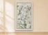 1783 Taylor & Skinner Strabane, Lifford, Omagh and Newtownstewart, Tyrone and Donegal Ireland road map displayed on a light cream wall. The map covers Counties Tyrone and Donegal.