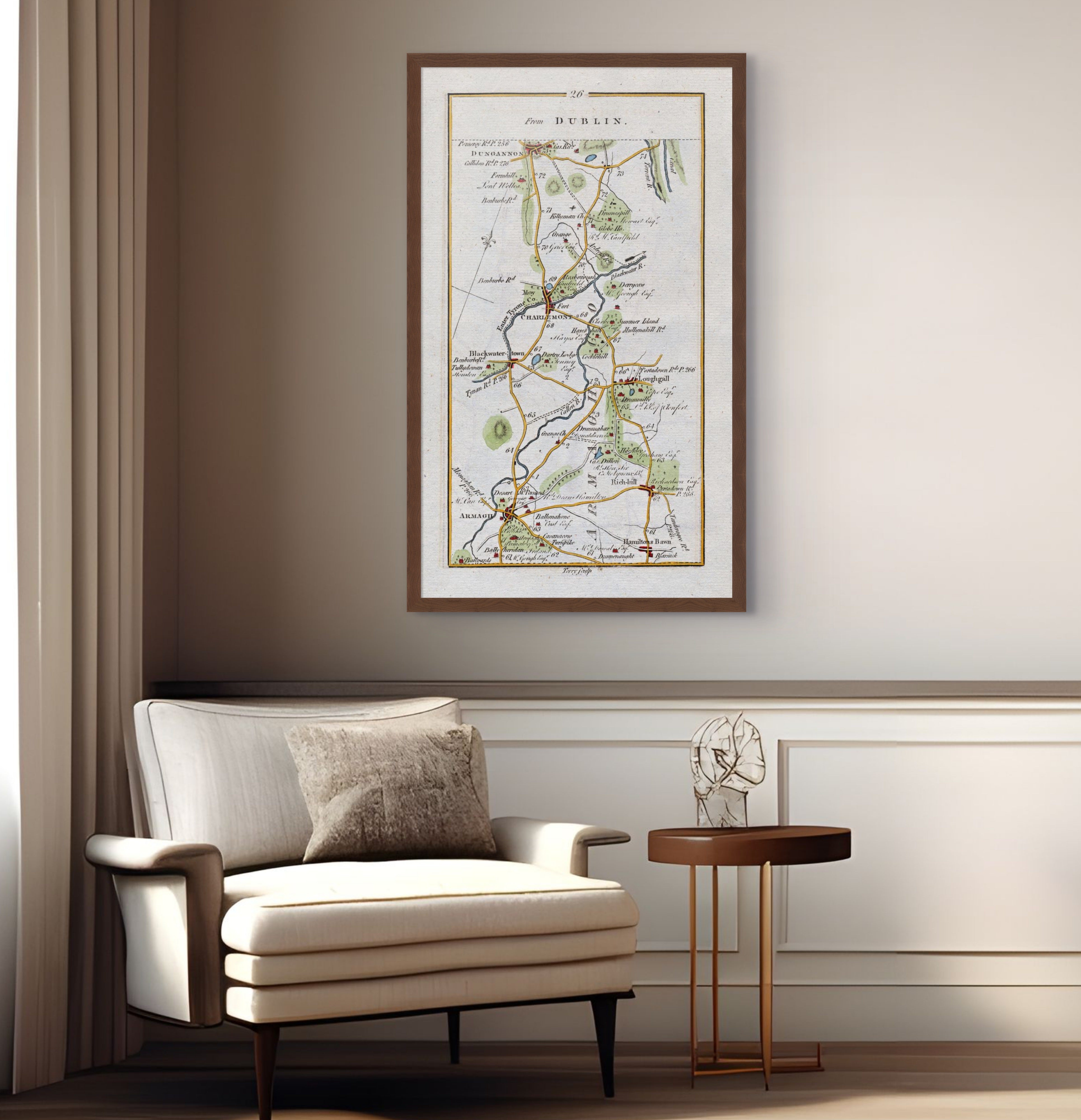 1783 Taylor & Skinner Armagh, Richhill, Loughgall, Charlemont and Dungannon Ireland road map displayed above an armchair in a neutral interior.