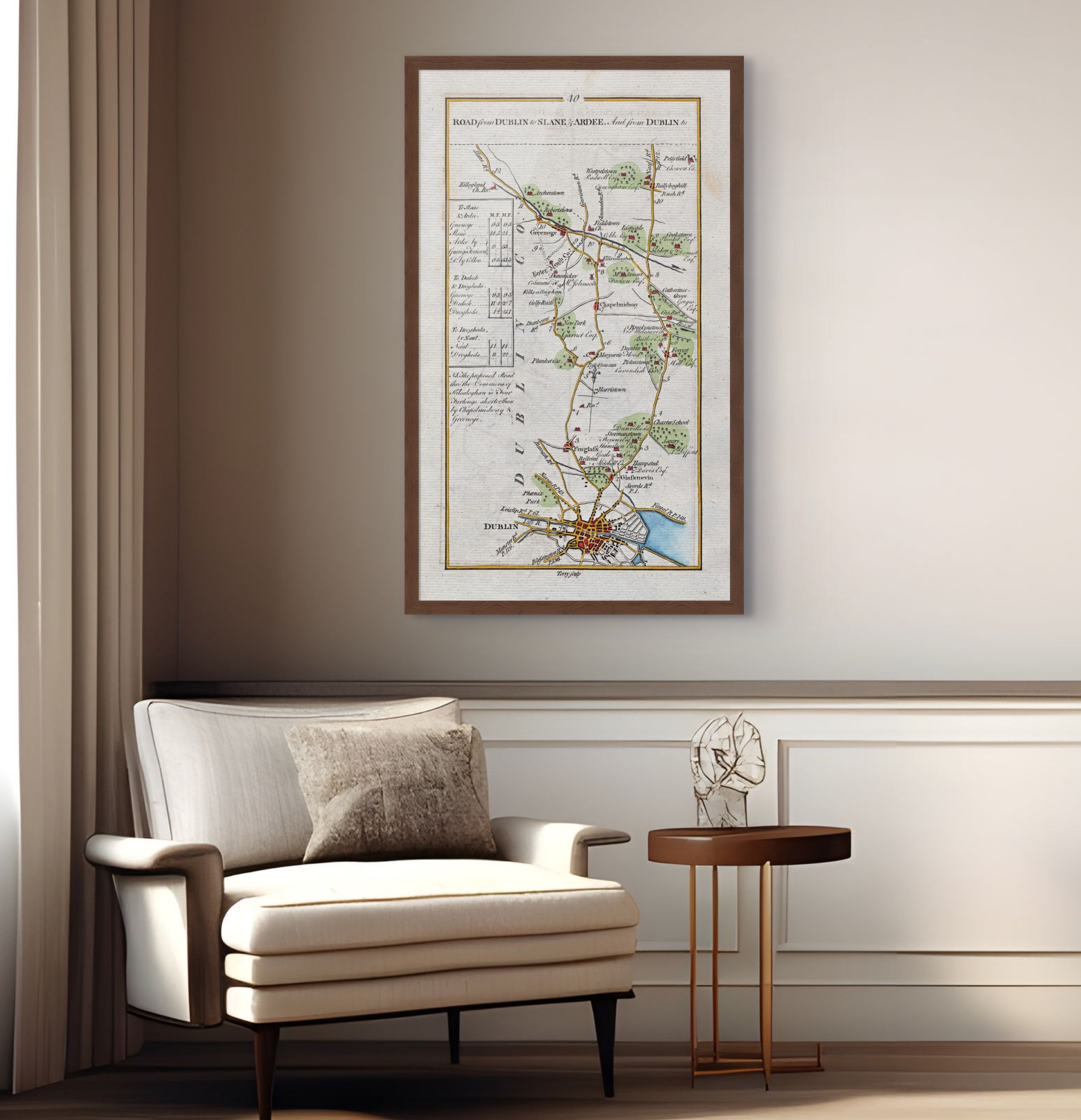 1783 Taylor & Skinner Dublin, Slane, Ardee, Duleek and Drogheda Ireland road map displayed above an armchair in a neutral interior. The map covers Counties Dublin, Meath and Louth.