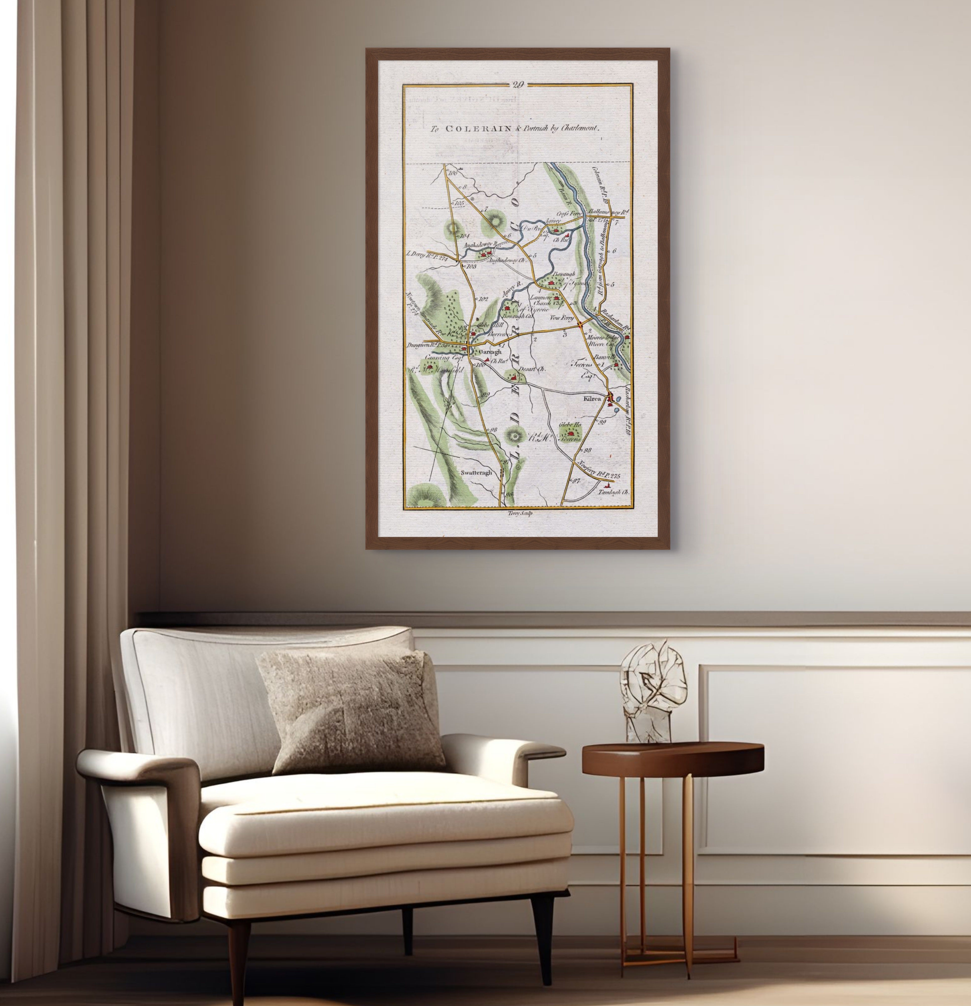 1783 Taylor & Skinner Garvagh, Kilrea, Aghadowey, Swatragh and River Bann Ireland road map displayed above an armchair in a neutral interior.