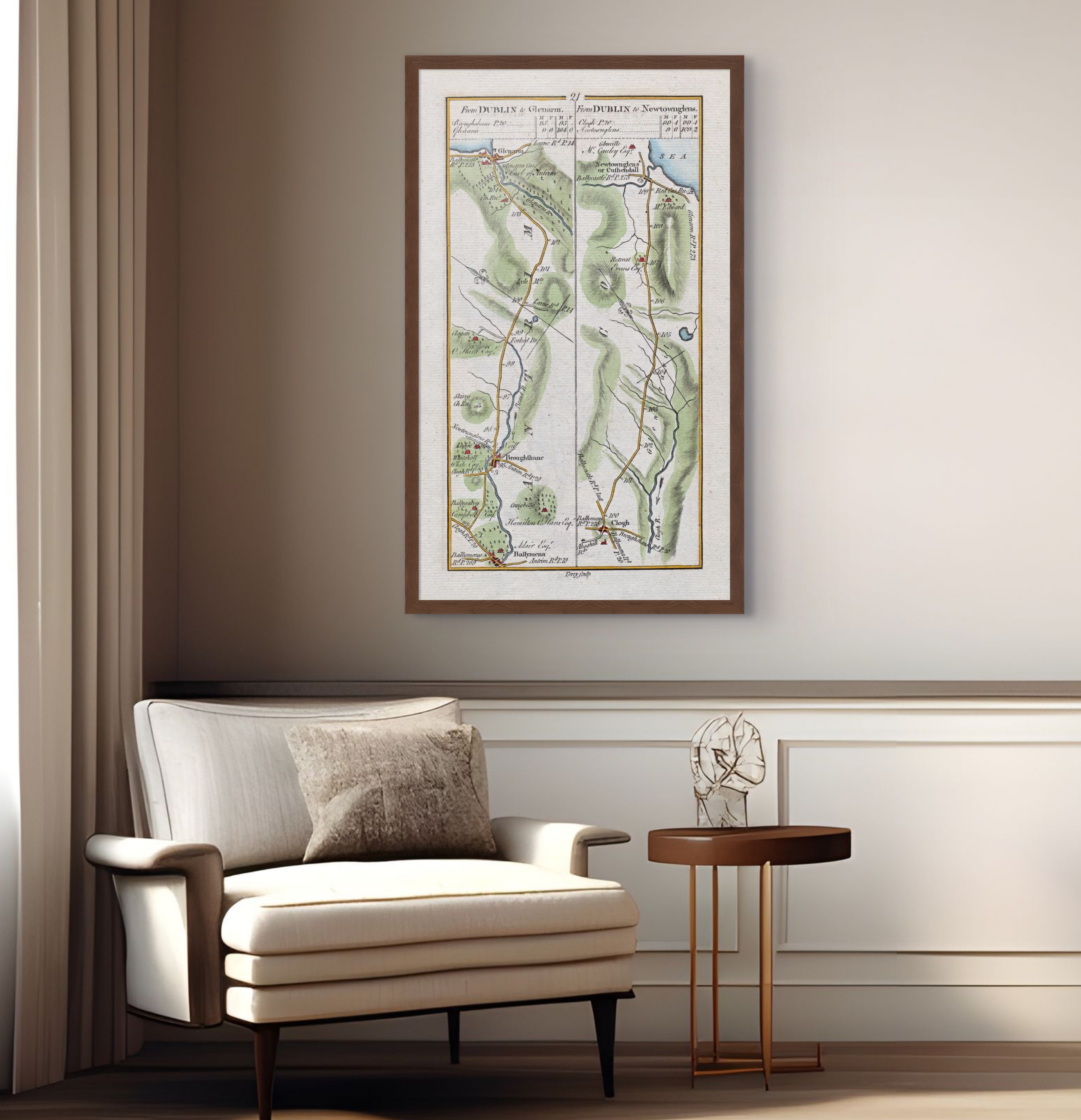 1783 Taylor & Skinner Glenarm, Cushendall, Ballymena, Broughshane and Clough Ireland road map displayed above an armchair in a neutral interior.