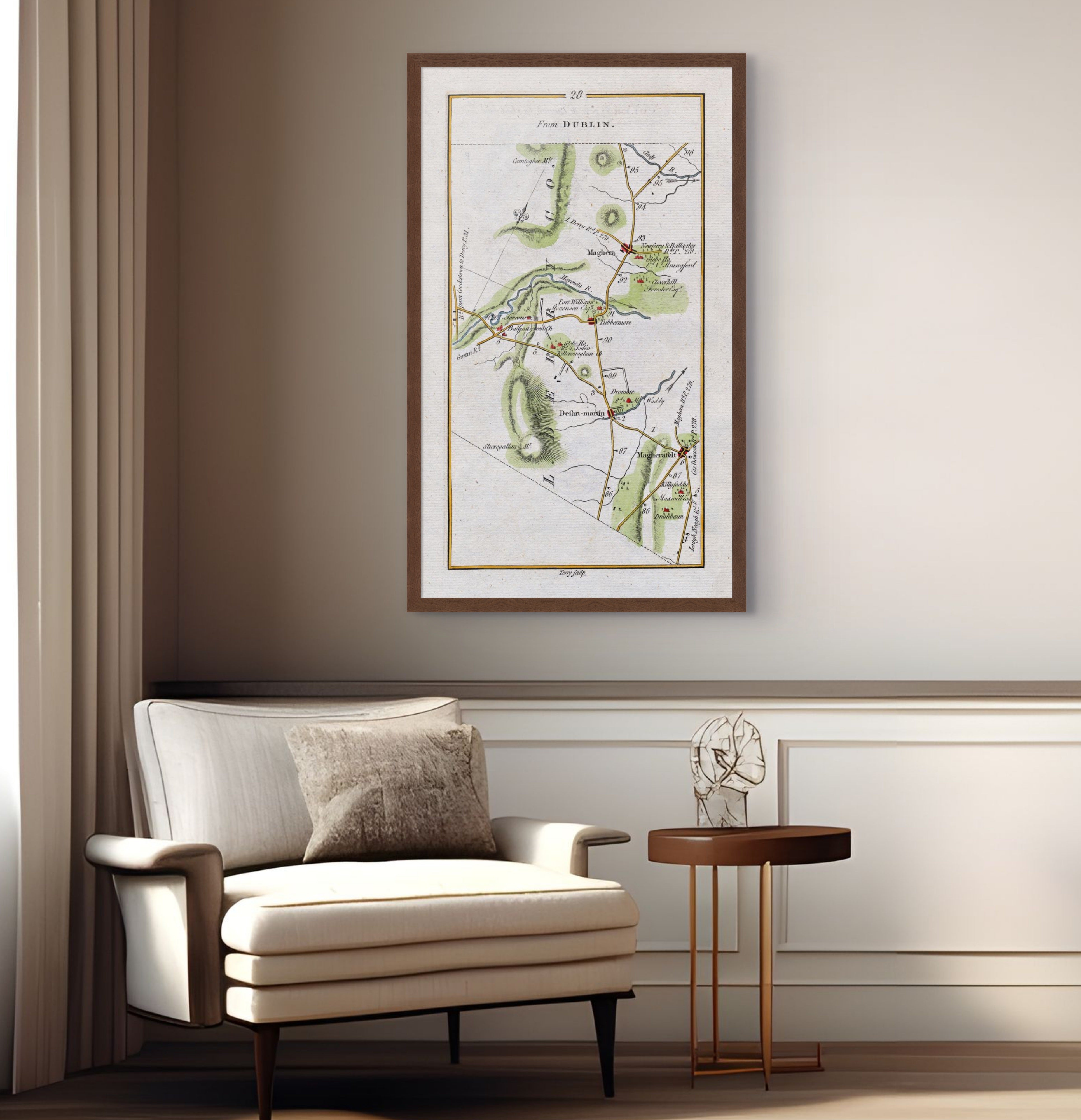 1783 Taylor & Skinner Maghera, Magherafelt, Tobermore, Desertmartin and Ballynascreen Ireland road map displayed above an armchair in a neutral interior.