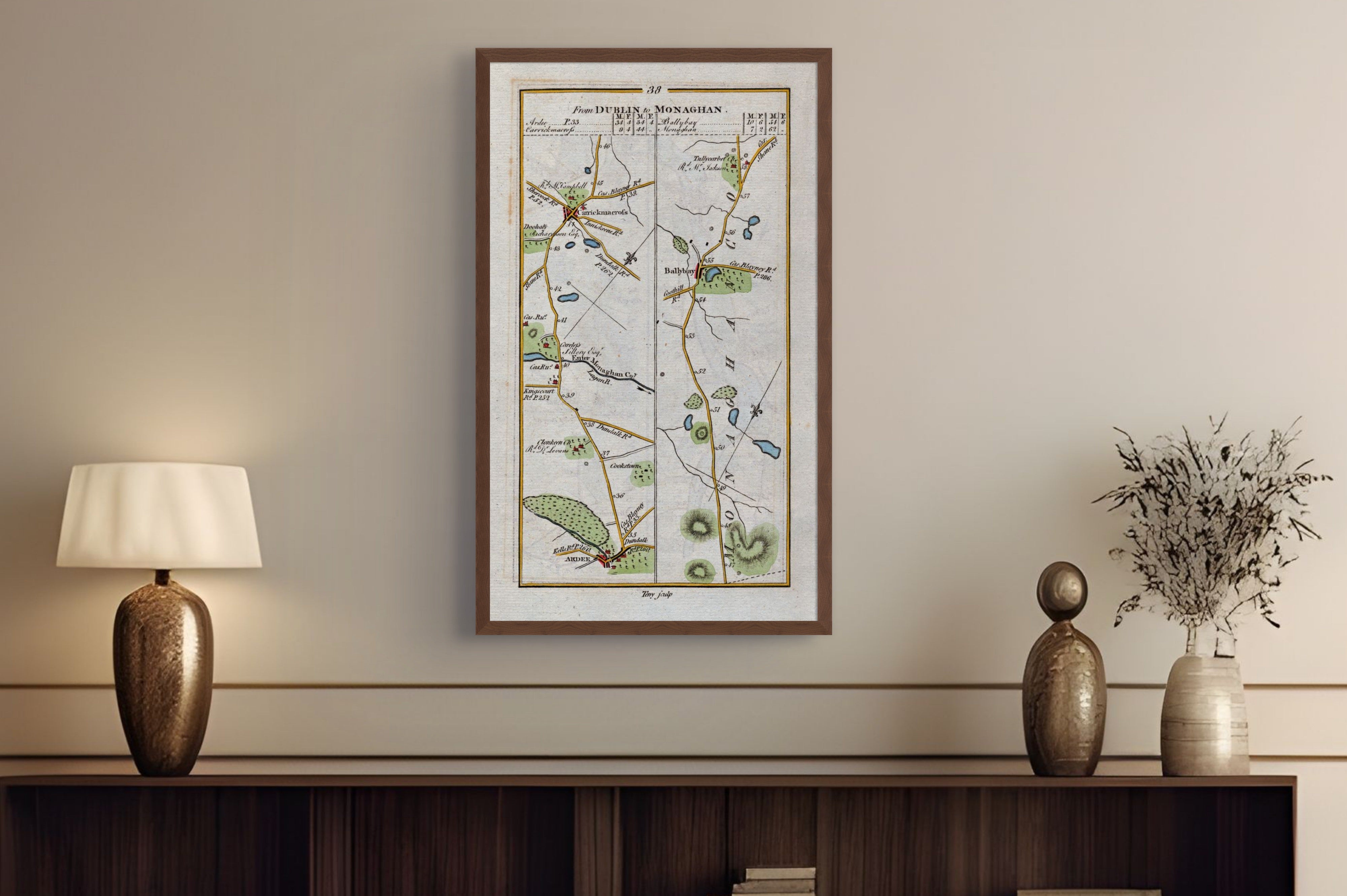 1783 Taylor & Skinner Ardee, Carrickmacross, Ballybay and Monaghan Ireland road map displayed above a console table. The map covers Counties Monaghan and Louth.