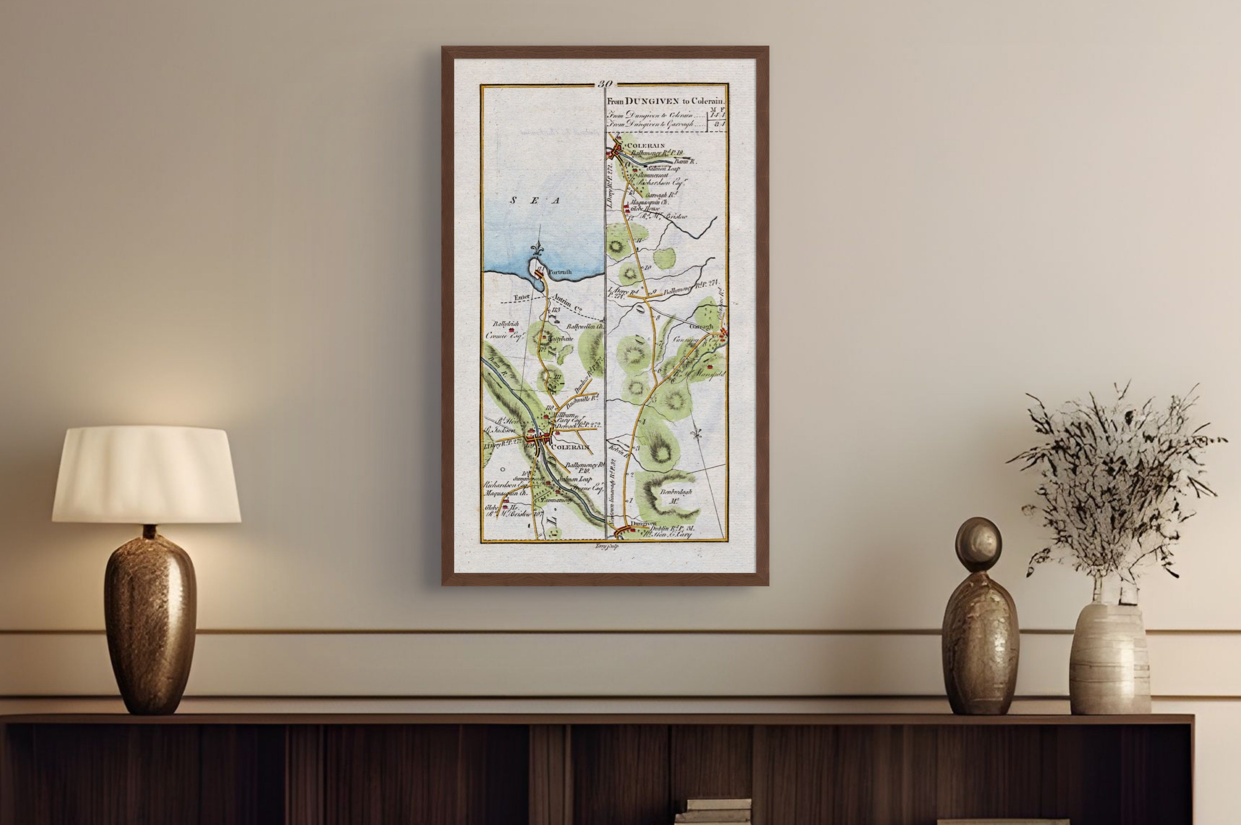 1783 Taylor & Skinner Coleraine and Portrush Ireland road map displayed above a console table.