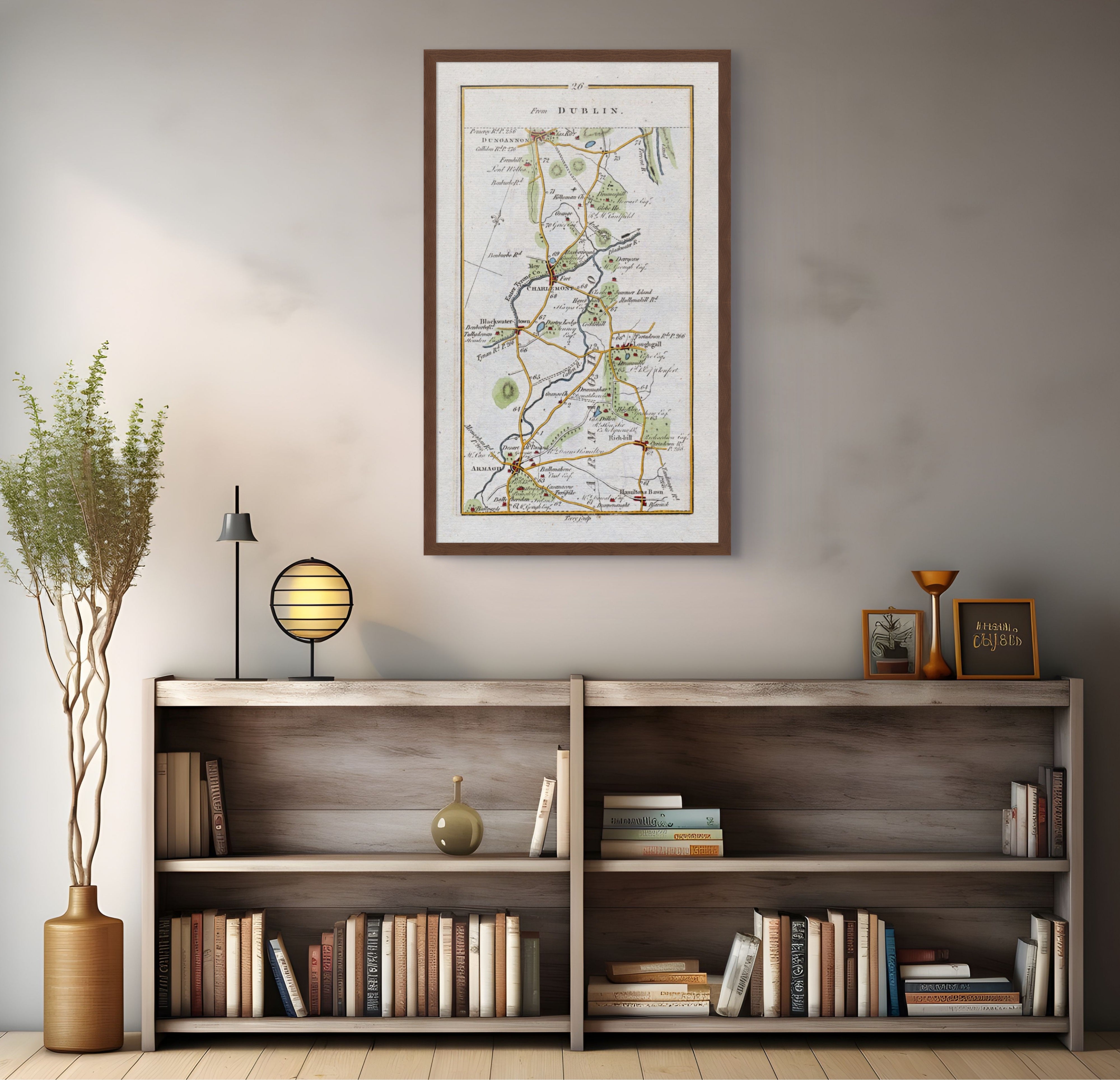 1783 Taylor & Skinner Armagh and Dungannon Ireland road map displayed above a bookshelf.