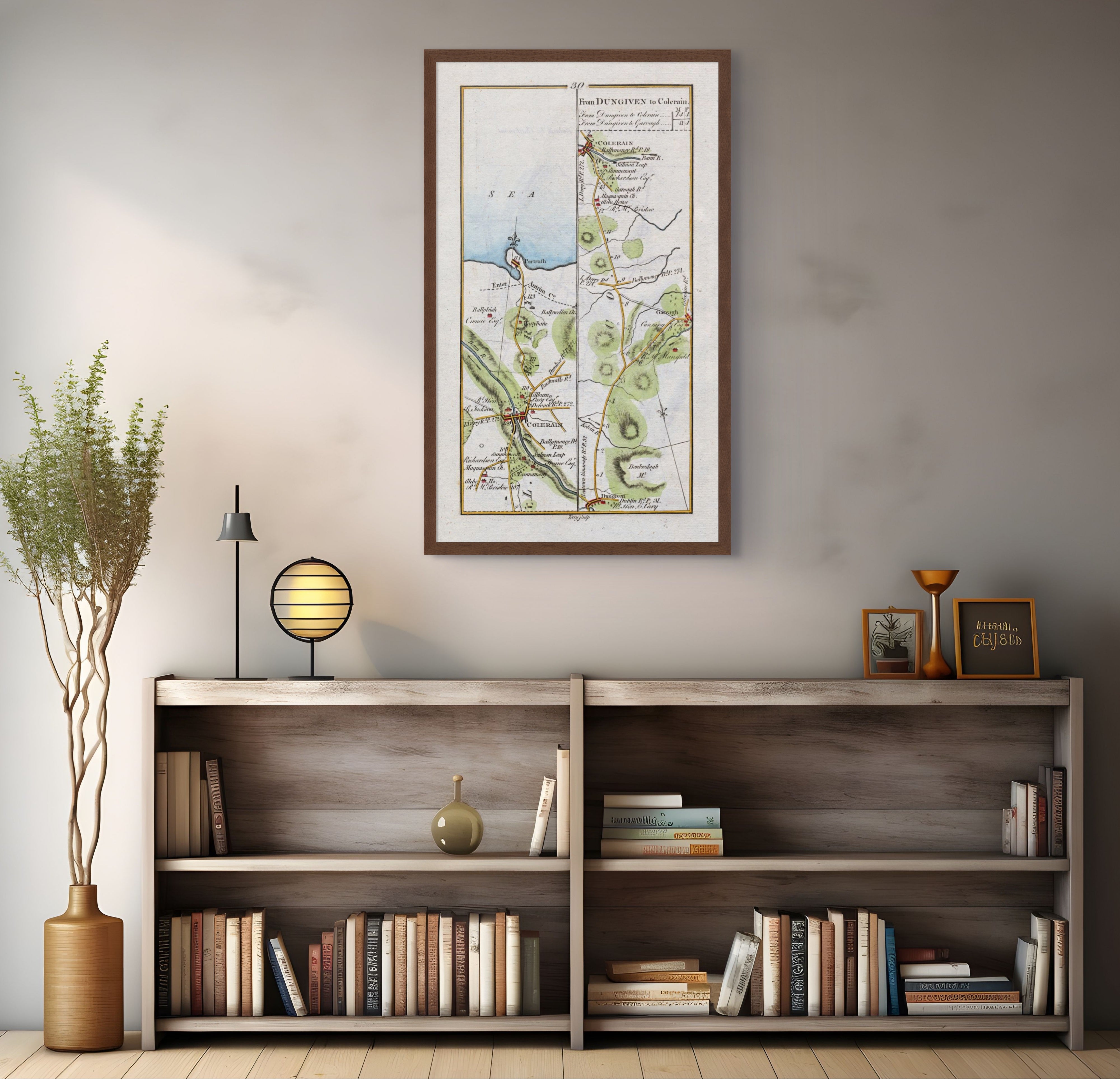 1783 Taylor & Skinner Coleraine and Portrush Ireland road map displayed above a bookshelf.
