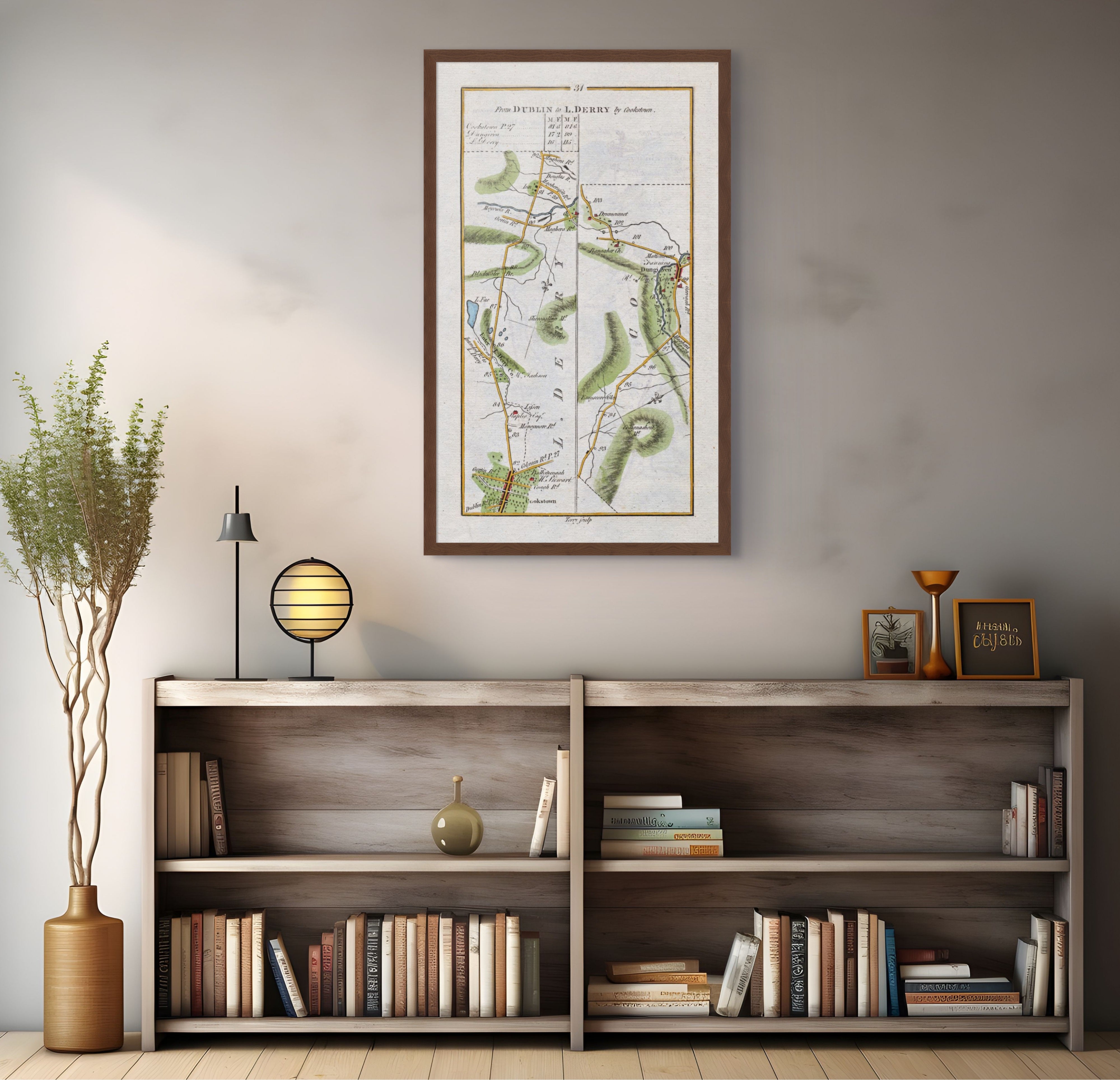1783 Taylor & Skinner Cookstown and Dungiven Ireland road map displayed above a bookshelf.