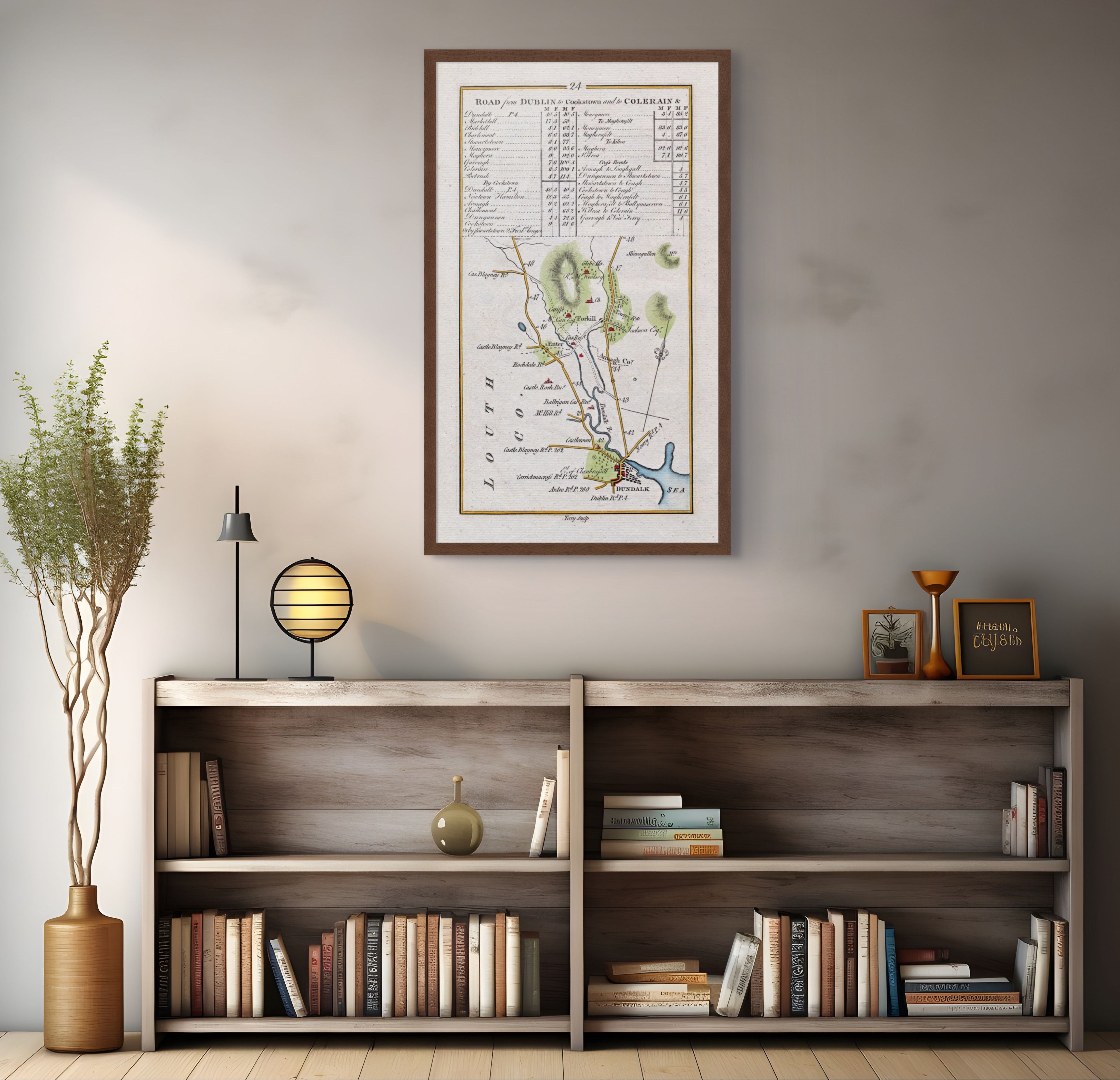 1783 Taylor & Skinner Dundalk and Forkhill Ireland road map displayed above a bookshelf.