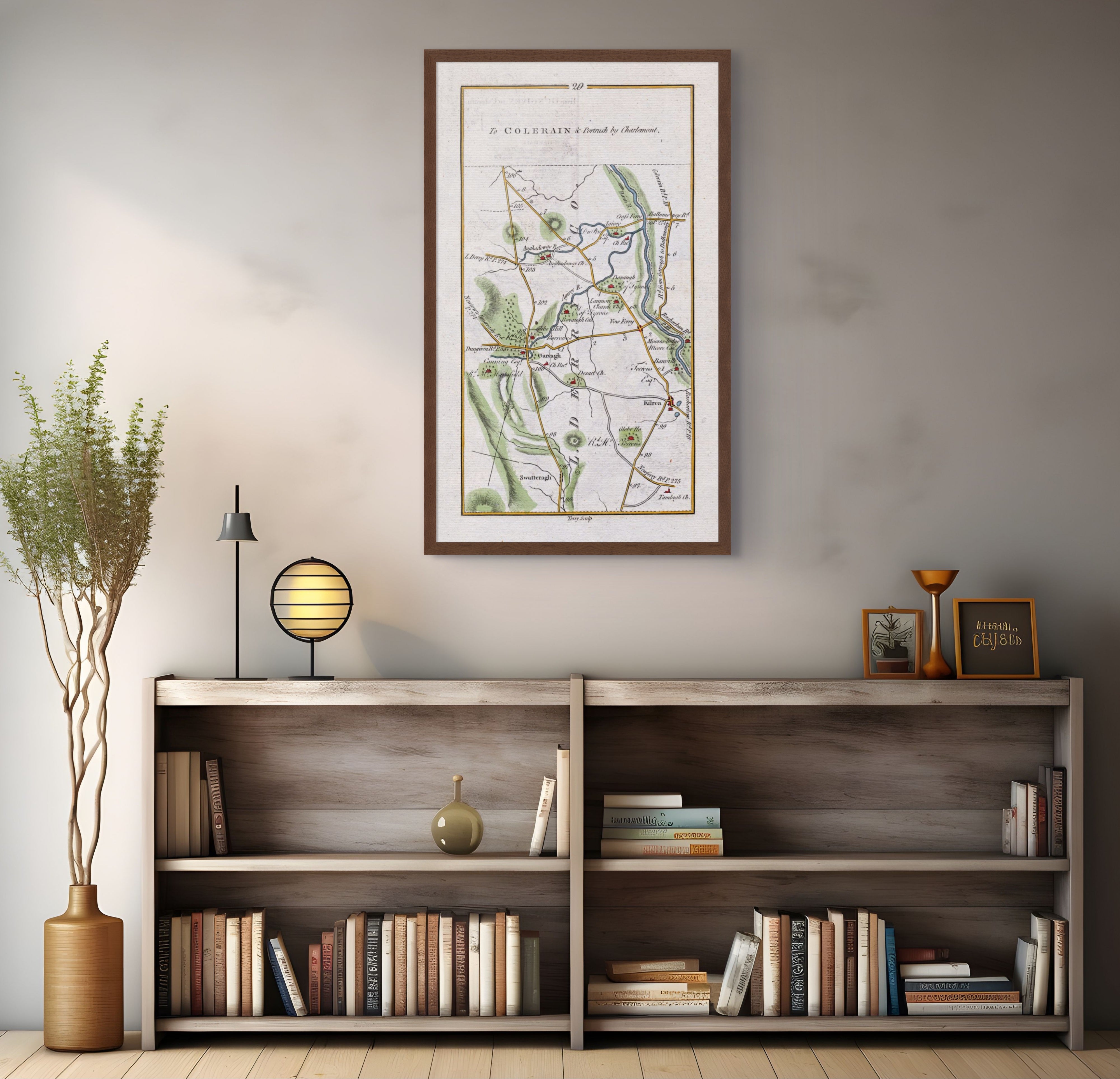 1783 Taylor & Skinner Garvagh and Kilrea Ireland road map displayed above a bookshelf.