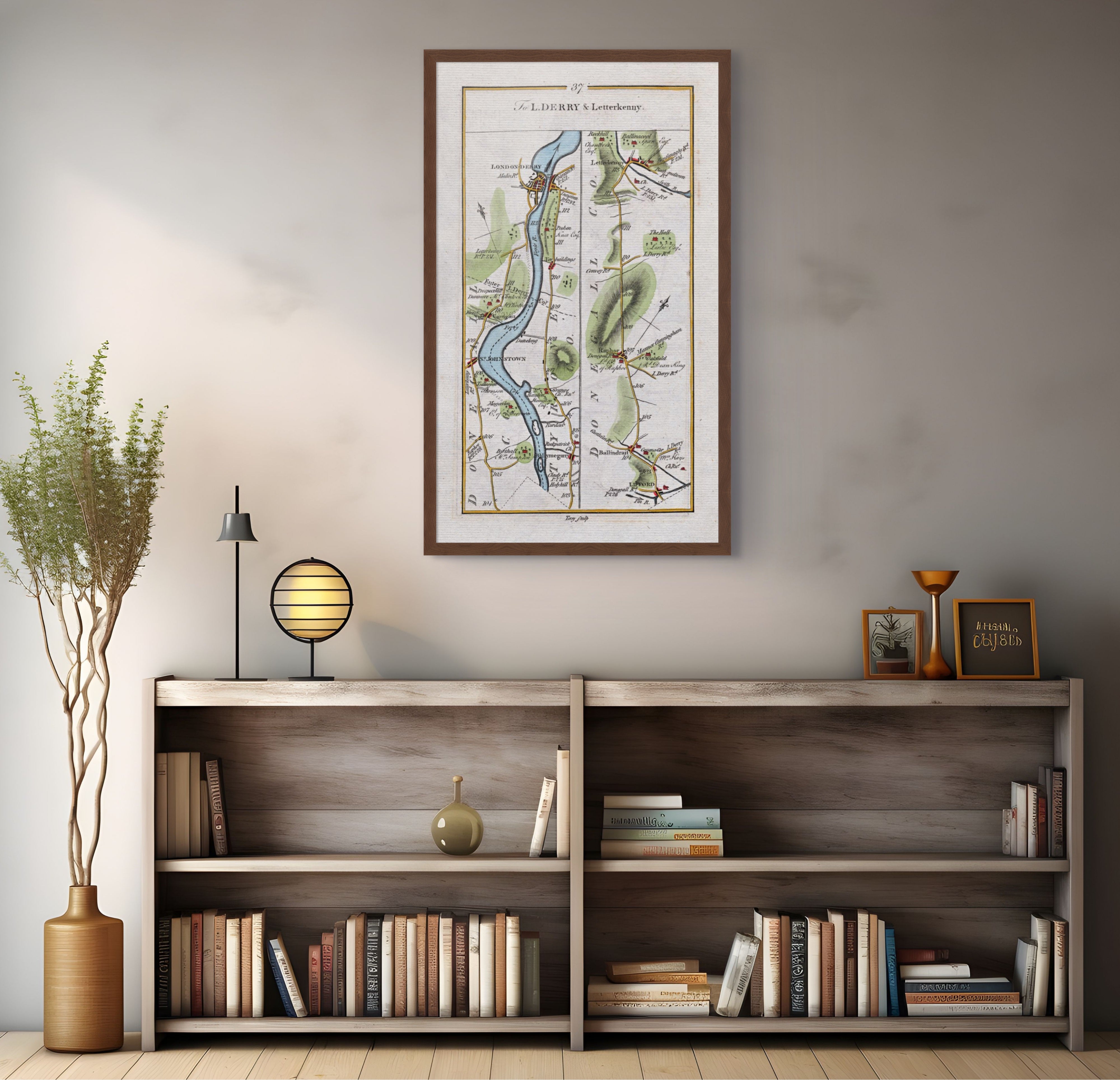 1783 Taylor & Skinner Londonderry, Letterkenny, Raphoe and Lifford Ireland road map displayed above a bookshelf. The map covers Counties Londonderry and Donegal.
