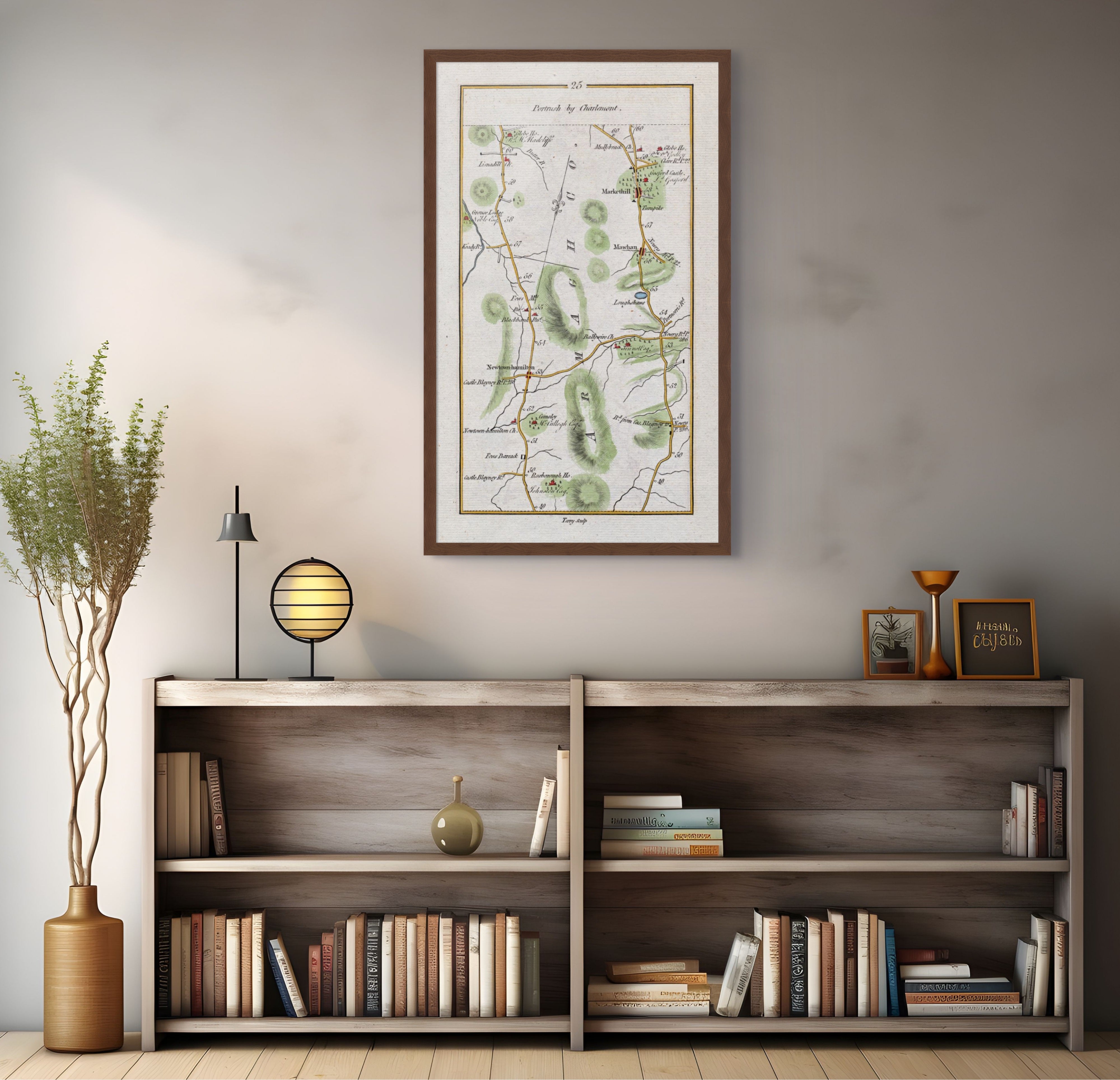 1783 Taylor & Skinner Markethill and Newtownhamilton Ireland road map displayed above a bookshelf.