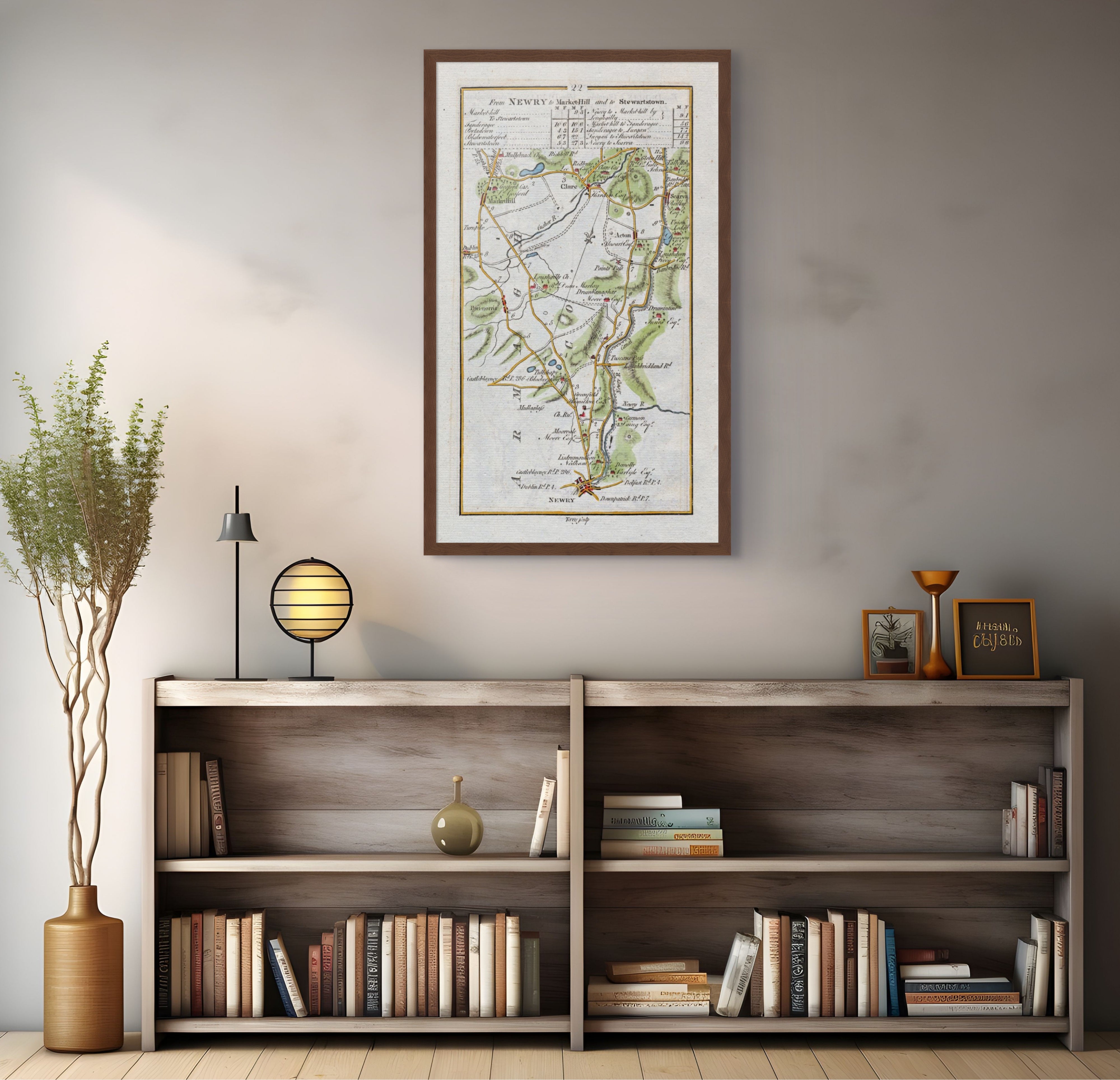 1783 Taylor & Skinner Newry and Markethill Ireland road map displayed above a bookshelf.