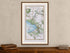 Framed 1783 Taylor & Skinner Antrim, Randalstown, Kells, Connor and Grange, Ireland road map displayed above an antique wooden cabinet.