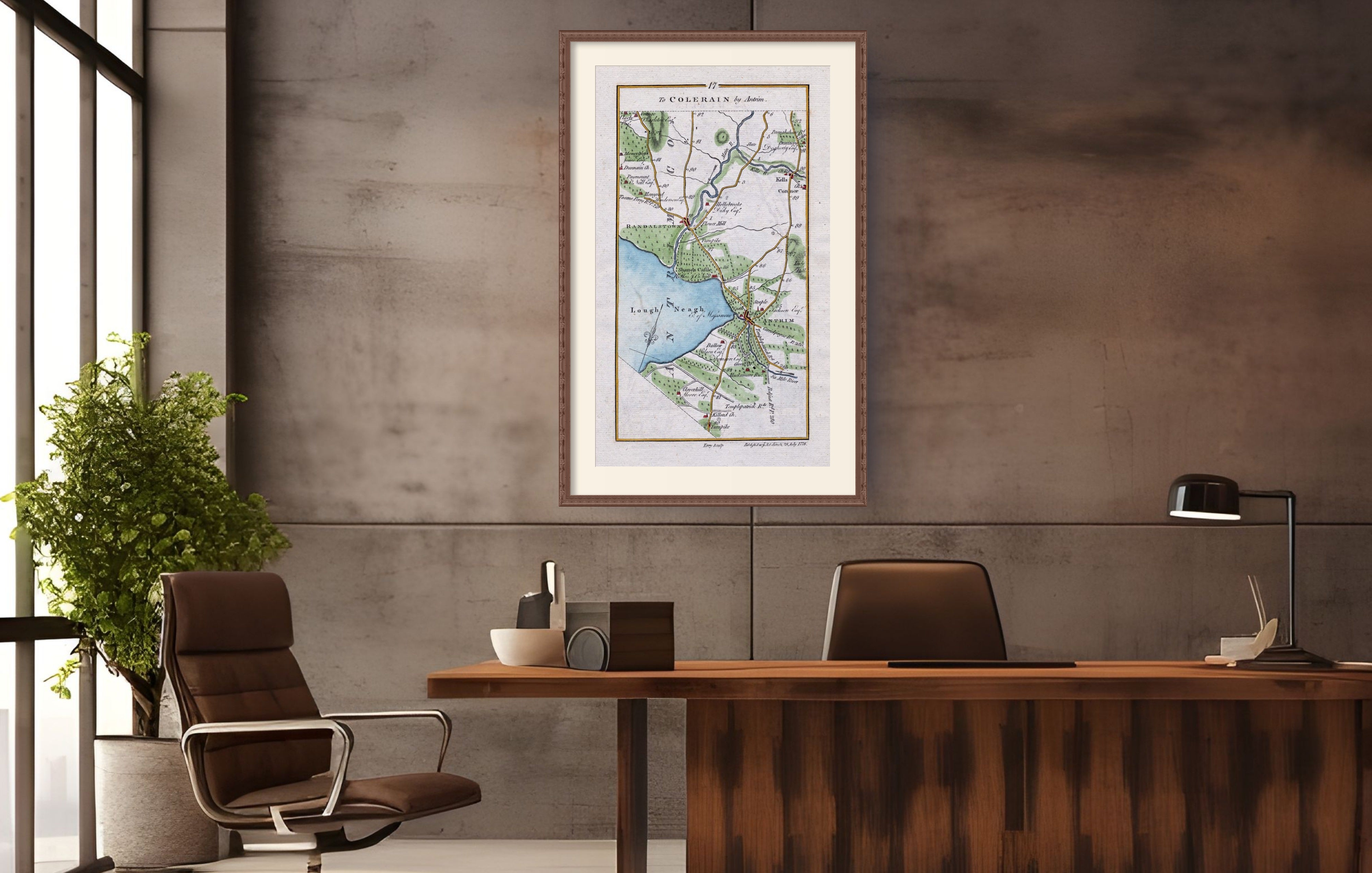 Framed 1783 Taylor & Skinner Ireland road map of Antrim, Randalstown, Kells, Connor and Grange displayed in a modern office interior.