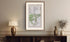 Framed antique Ireland road map of Banbridge, Gilford, Waringstown and Loughbrickland displayed in a styled room interior.