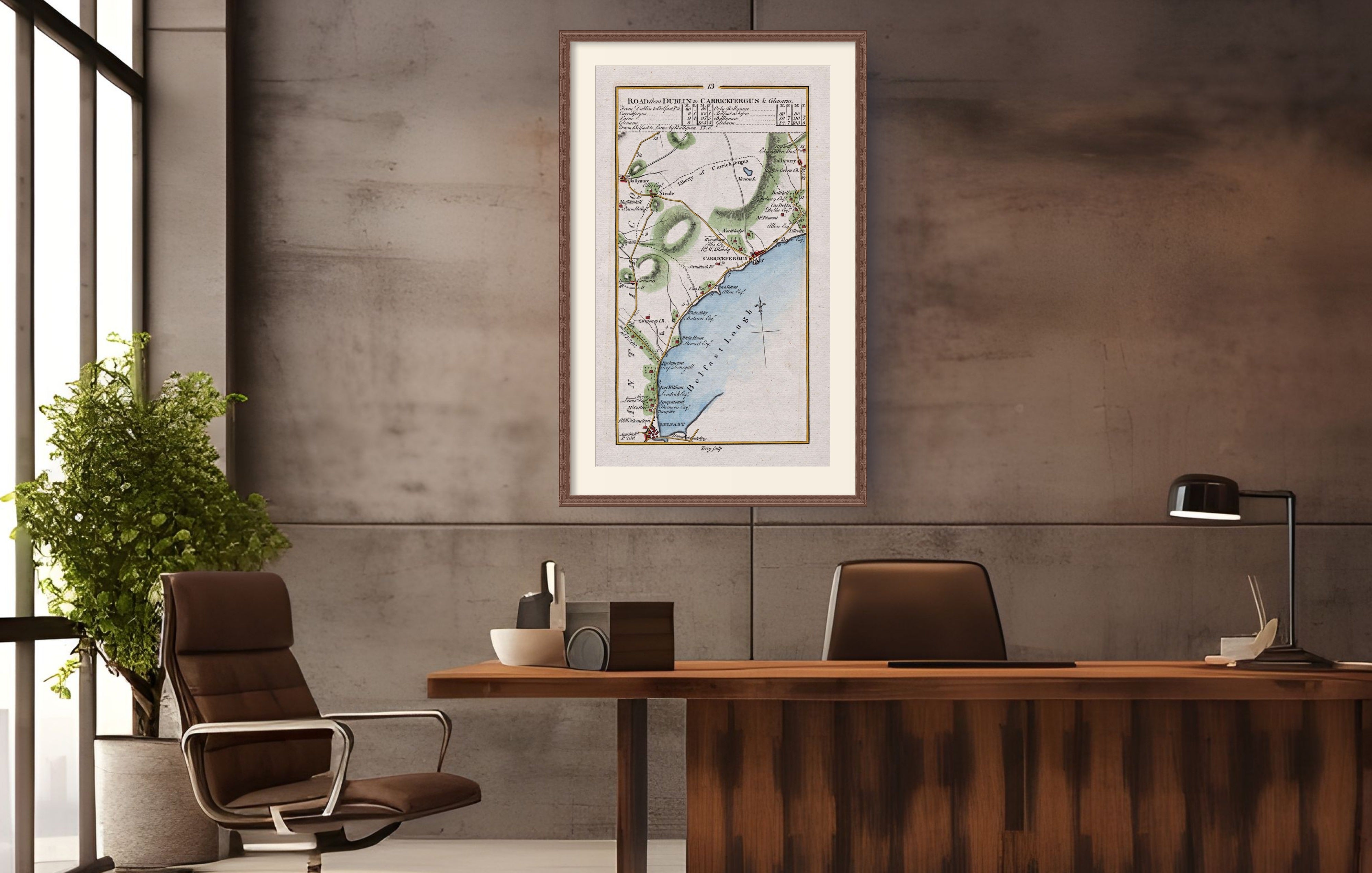 Framed 1783 Taylor & Skinner Ireland road map of Belfast, Carrickfergus, Ballynure, Whiteabbey and Ballycarry displayed in a modern office interior.