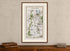 Framed 1783 Taylor & Skinner Belfast, Lisburn, Banbridge and Hillsborough road map displayed above an antique wooden cabinet.