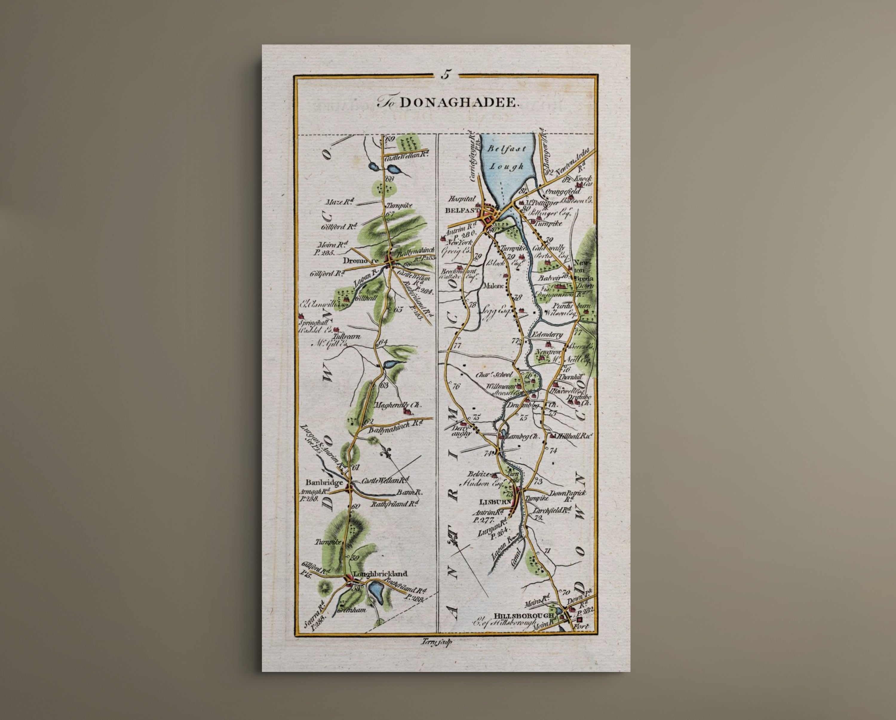 Complete 1783 Taylor & Skinner Belfast, Lisburn and Banbridge antique road map displayed against a plain neutral wall.