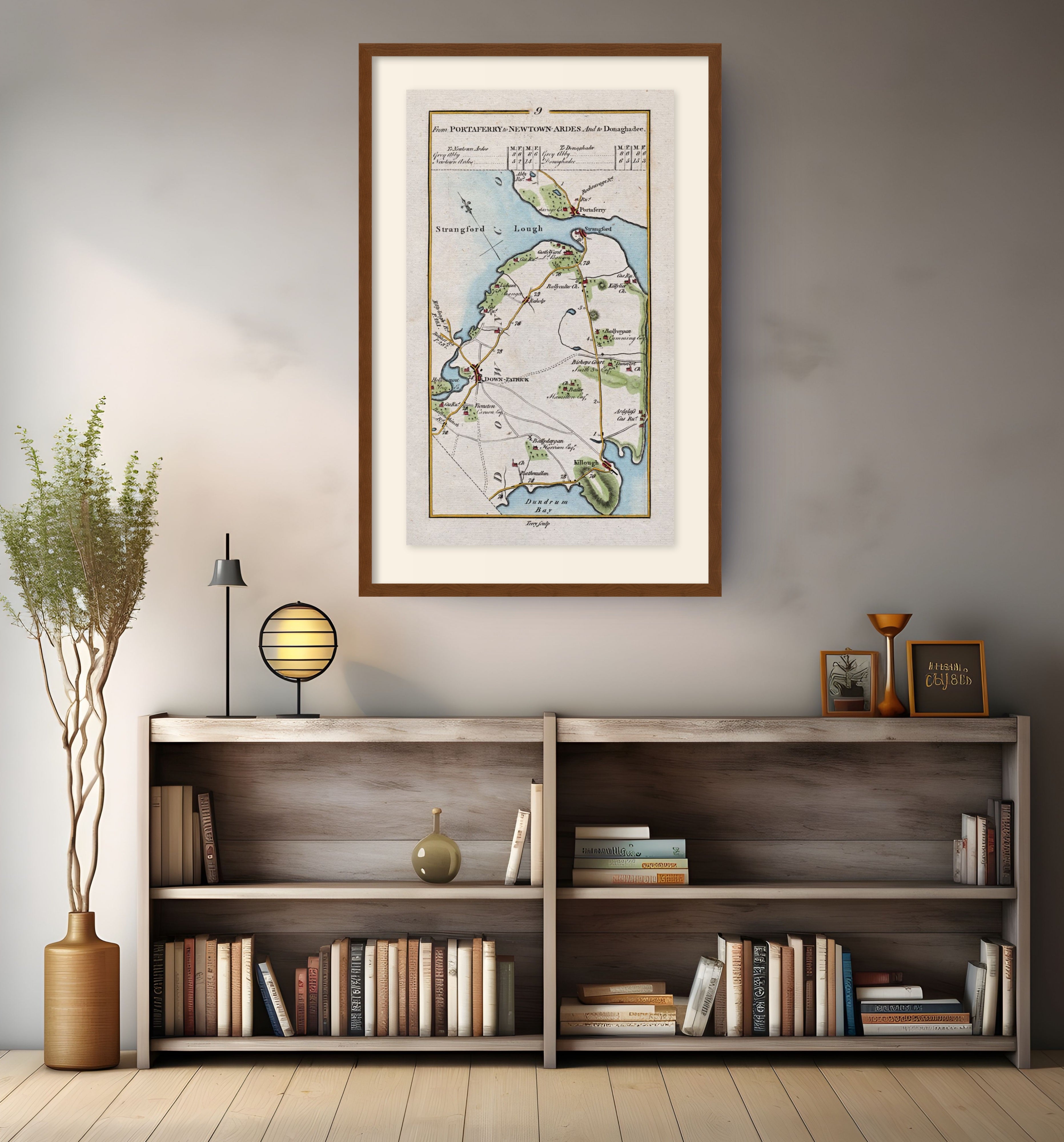 Framed antique Ireland road map of Downpatrick, Strangford, Portaferry and Killough displayed in a modern interior.