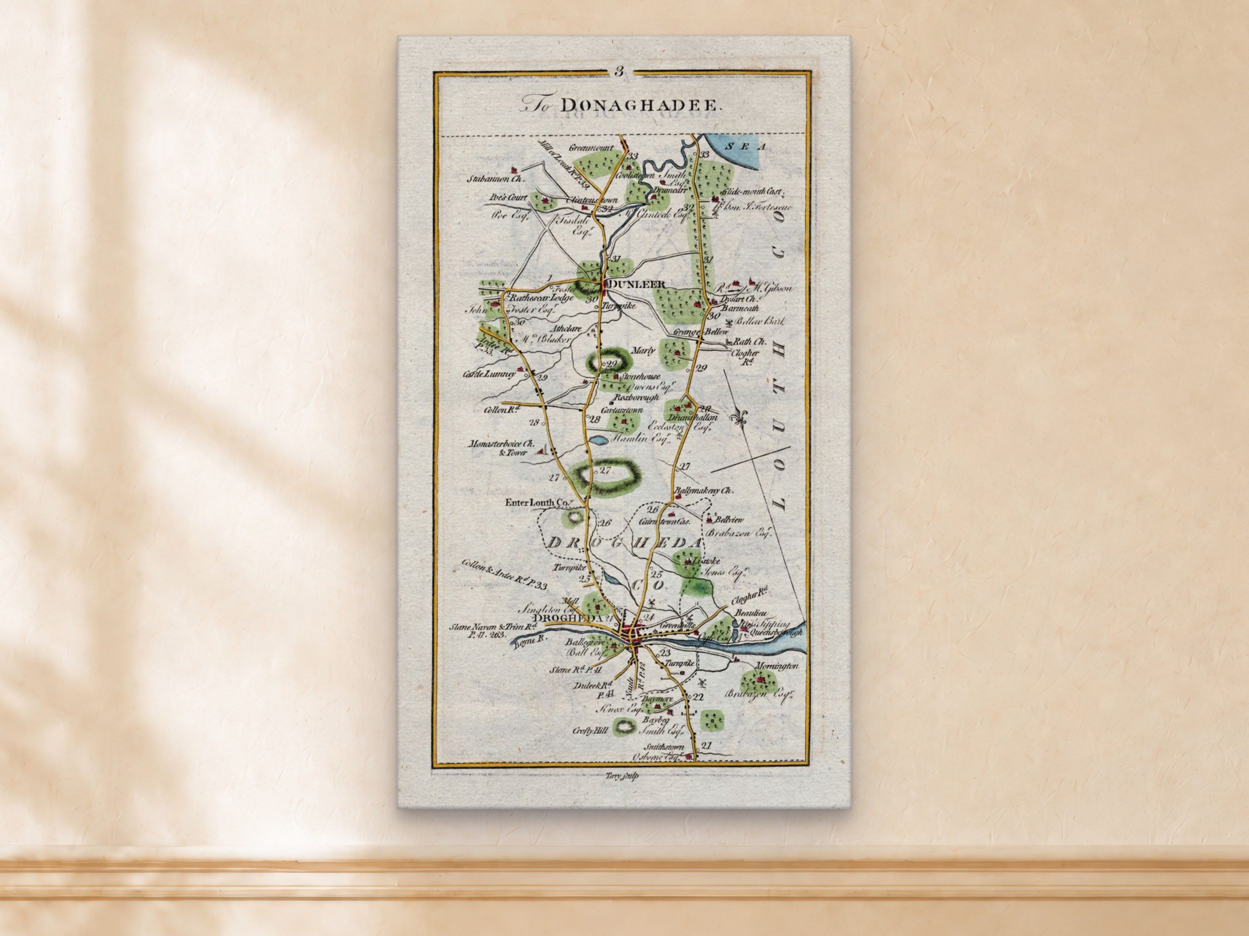 1783 Taylor & Skinner Drogheda, Dunleer, Monasterboice and Stabannon Ireland road map displayed on a light cream wall.
