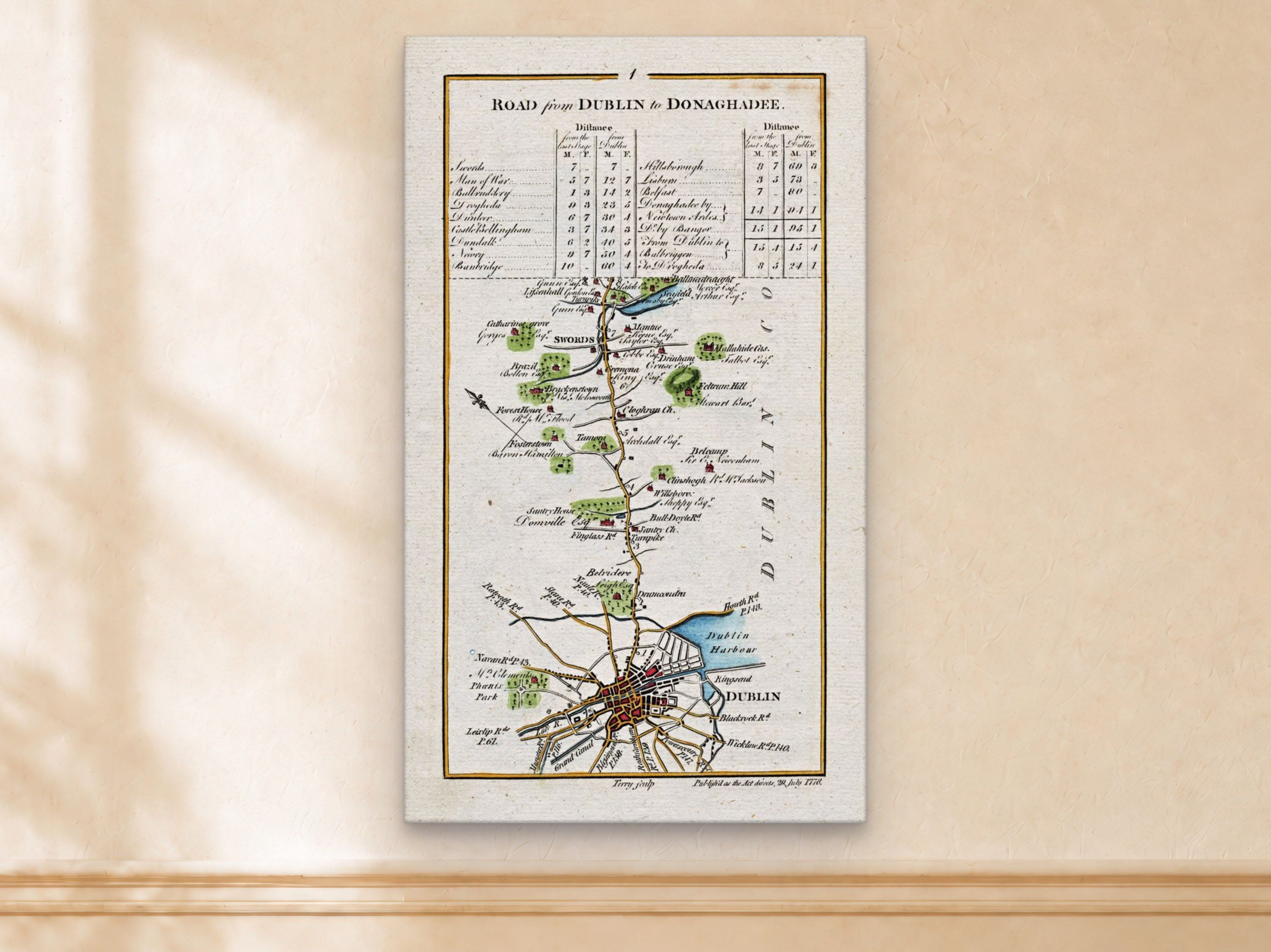 1783 Taylor & Skinner Dublin, Swords and Donaghadee Ireland road map displayed on a light cream wall.