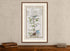 Framed 1783 Taylor & Skinner Ireland road map showing Dublin, Swords and Donaghadee, displayed above an antique wooden cabinet.