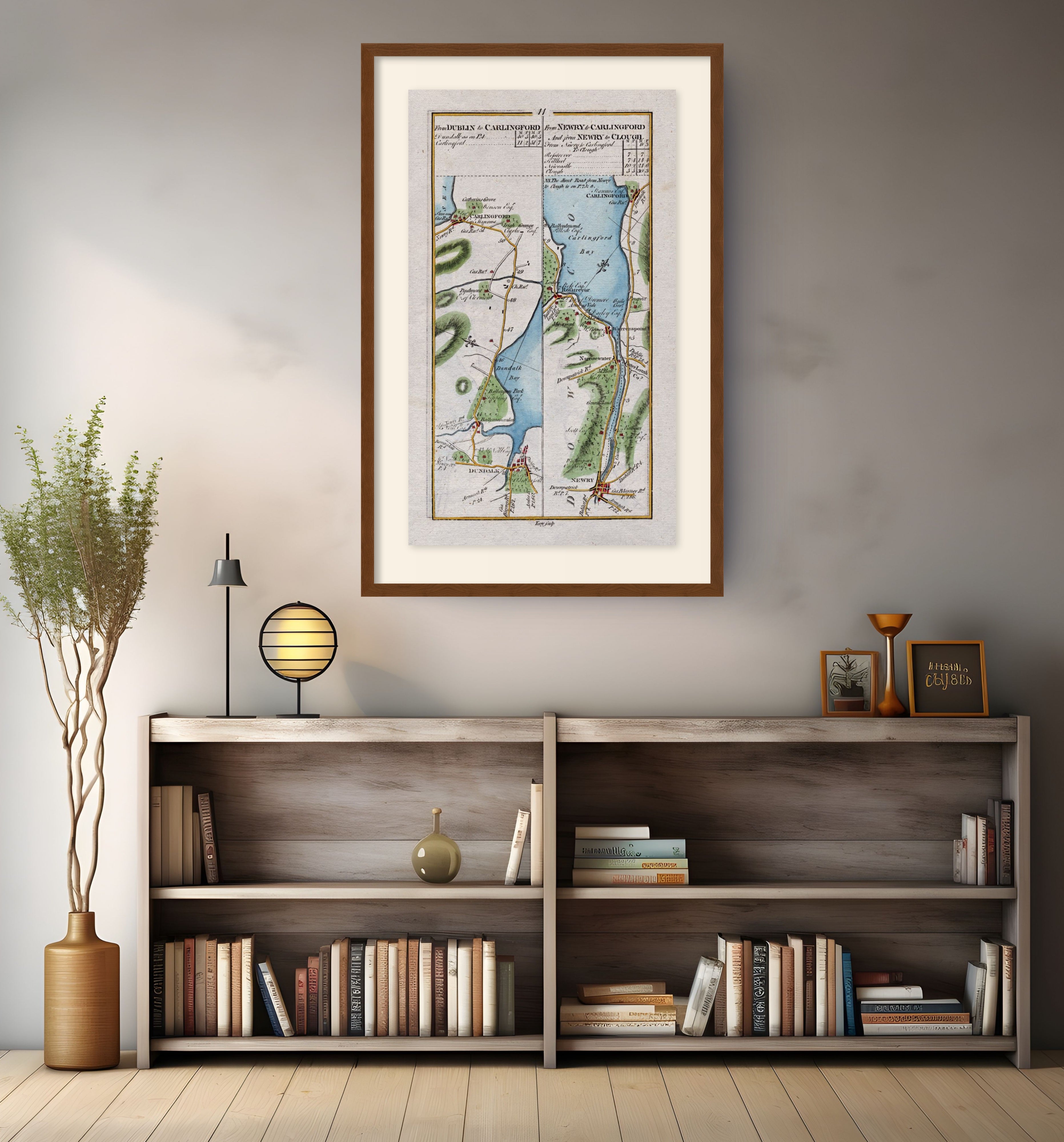 Framed antique Ireland road map of Dundalk, Carlingford, Newry, Warrenpoint and Rostrevor displayed in a modern interior.