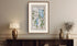 Framed antique Ireland road map of Dundalk, Carlingford, Newry, Warrenpoint and Rostrevor displayed in a styled room interior.