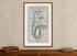 Framed 1783 Taylor & Skinner Ireland road map showing Holywood, Bangor, Newtownards and Donaghadee, displayed above an antique wooden cabinet.