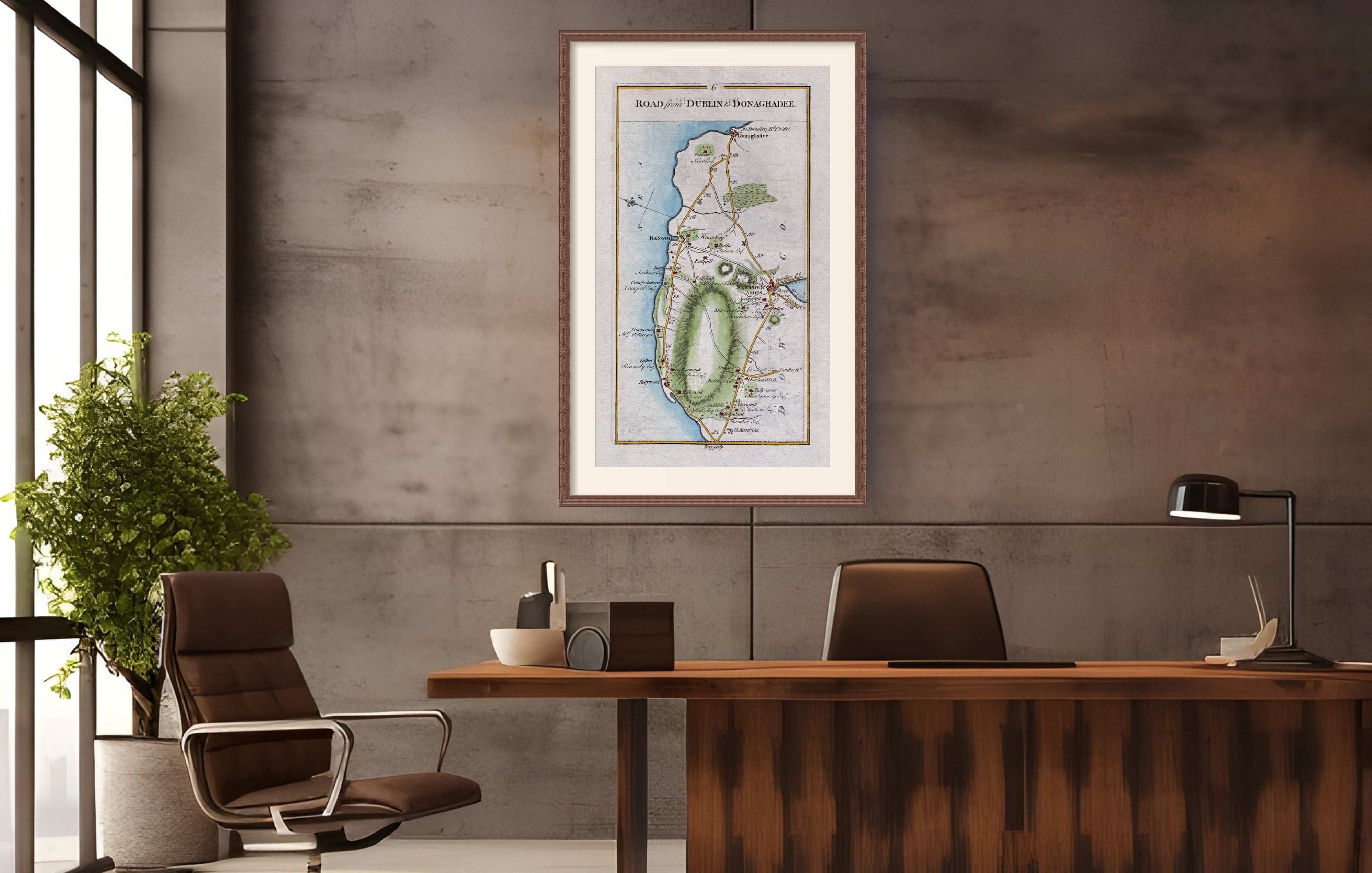 Framed 1783 Taylor & Skinner Ireland road map of Holywood, Bangor, Newtownards and Donaghadee displayed in a modern office interior.