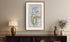 Framed antique Ireland road map of Holywood, Bangor, Newtownards and Donaghadee displayed in a styled room interior.
