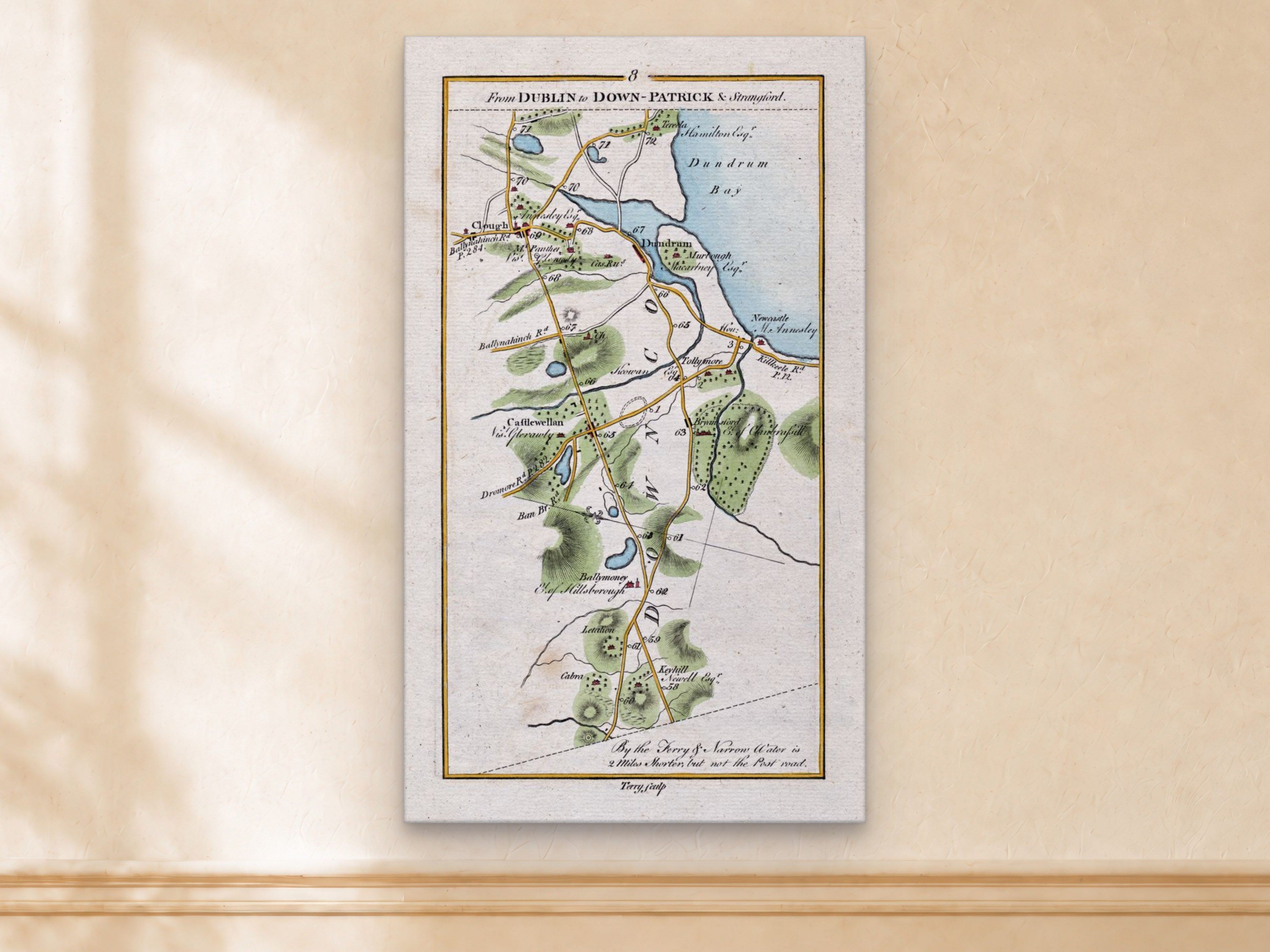 1783 Taylor & Skinner Newcastle, Castlewellan, Dundrum and Clough Ireland road map displayed on a light cream wall.