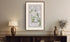 Framed antique Ireland road map of Newry, Rathfriland, Narrow Water and Jonesborough displayed in a styled room interior.