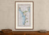 Framed 1783 Taylor & Skinner Ireland road map showing Newtownards, Donaghadee, Greyabbey and Kircubbin, displayed above an antique wooden cabinet.