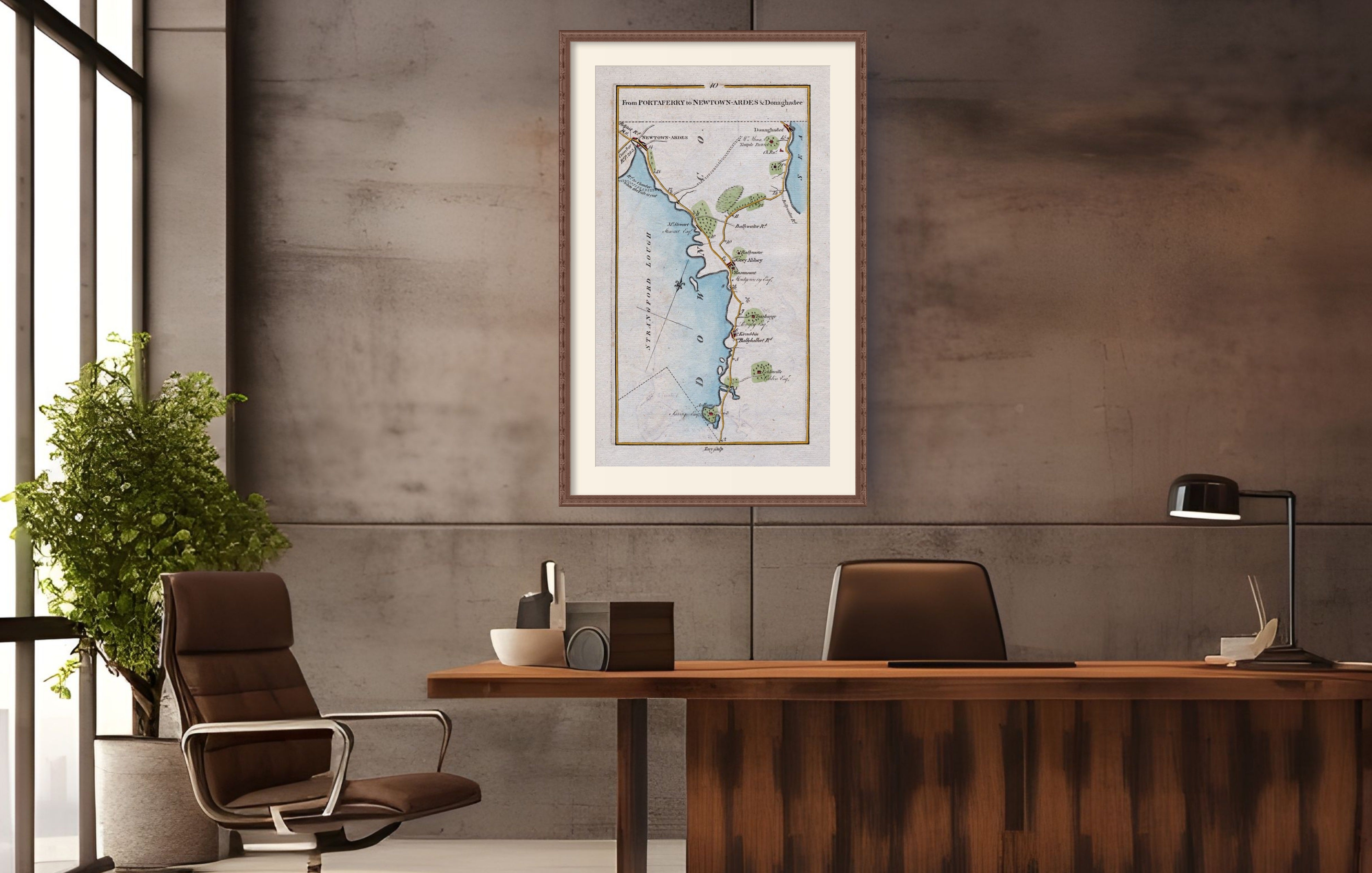 Framed 1783 Taylor & Skinner Ireland road map of Newtownards, Donaghadee, Greyabbey and Kircubbin displayed in a modern office interior.