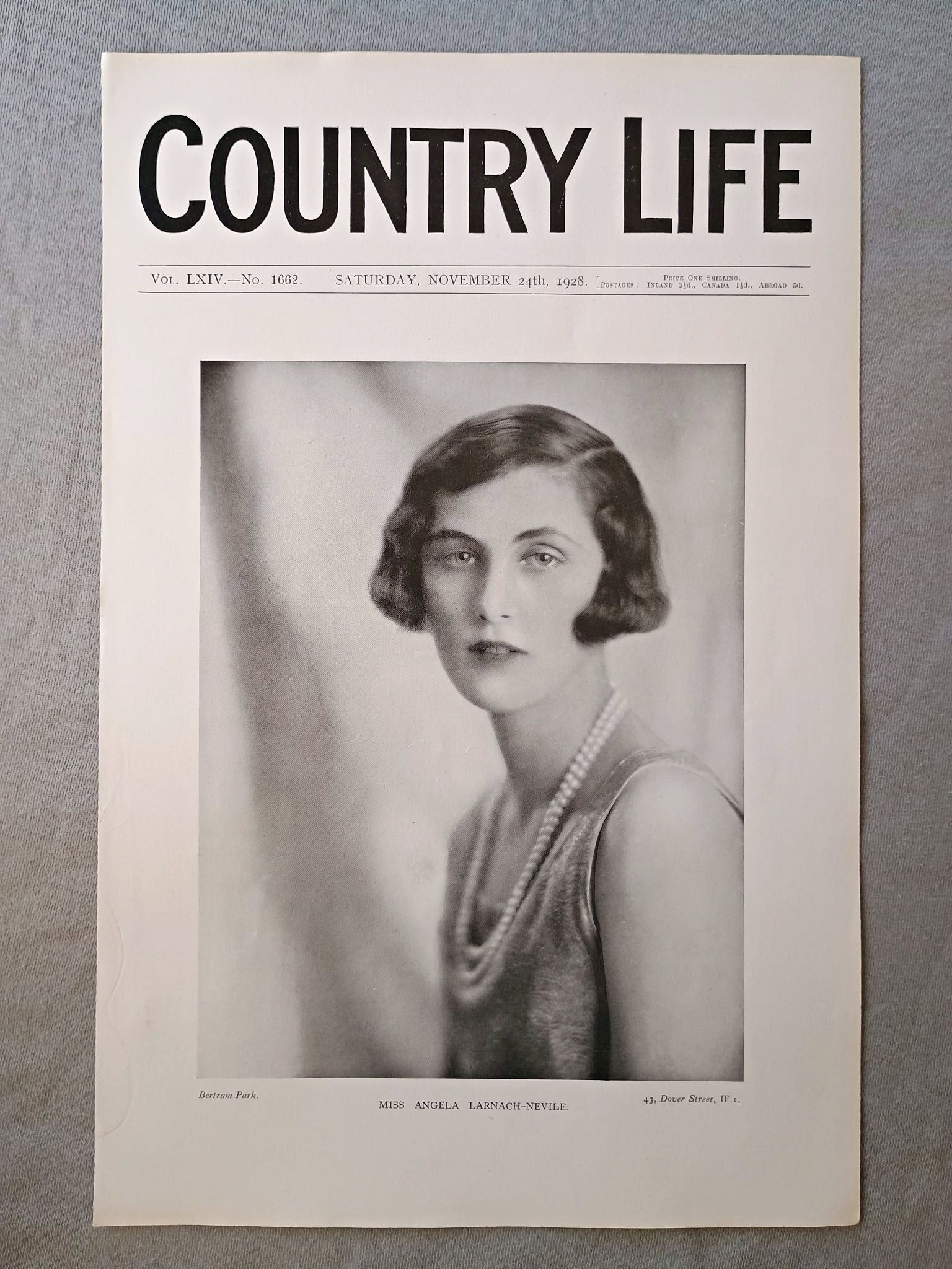 Miss Angela Larnach-Nevile Country Life Magazine Portrait, Frontispiece, November 24 1928. LXIV No. 1662

The featured Frontispiece this week is a portrait of Miss Angela Larnach-Nevile, only daughter of Major and Mrs. Guy Larnach-Nevile