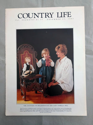 Countess of Hillsborough and Lady Isabella Hill Country Life Magazine Portrait November 25, 1993. CLXXXVII No. 47

The Countess of Hillsborough and Lady Isabella Hill - Countess of Hillsborough's loathing of "ghastly plastic toys" spurred her into co-founding the Hill Toy Company last year. It specialises in old-fashioned and traditional toys, such as the hand-made rag doll based on 18th- and 19th-century designs in the chair. Lady Isabella, 21/2, however, has her own favourite..