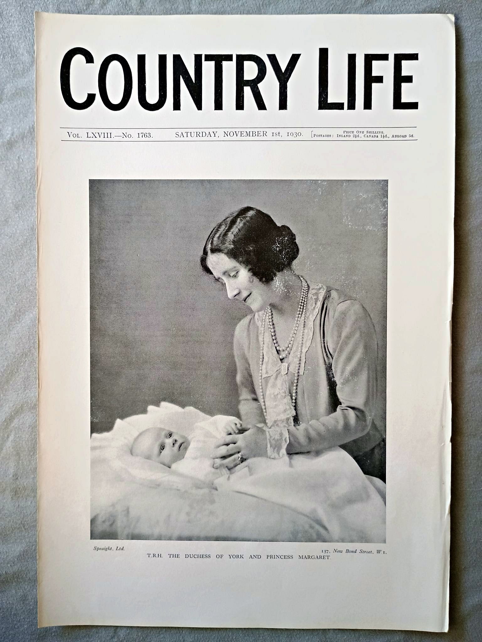 The Duchess of York and Princess Margaret Country Life Magazine Portrait, Frontispiece, November 1 1930. LXVIII No. 1763

The featured frontispiece this week is a portrait of H.R.H. the Duchess of York with Princess Margaret, whose christening took place at Buckingham Palace on Thursday.