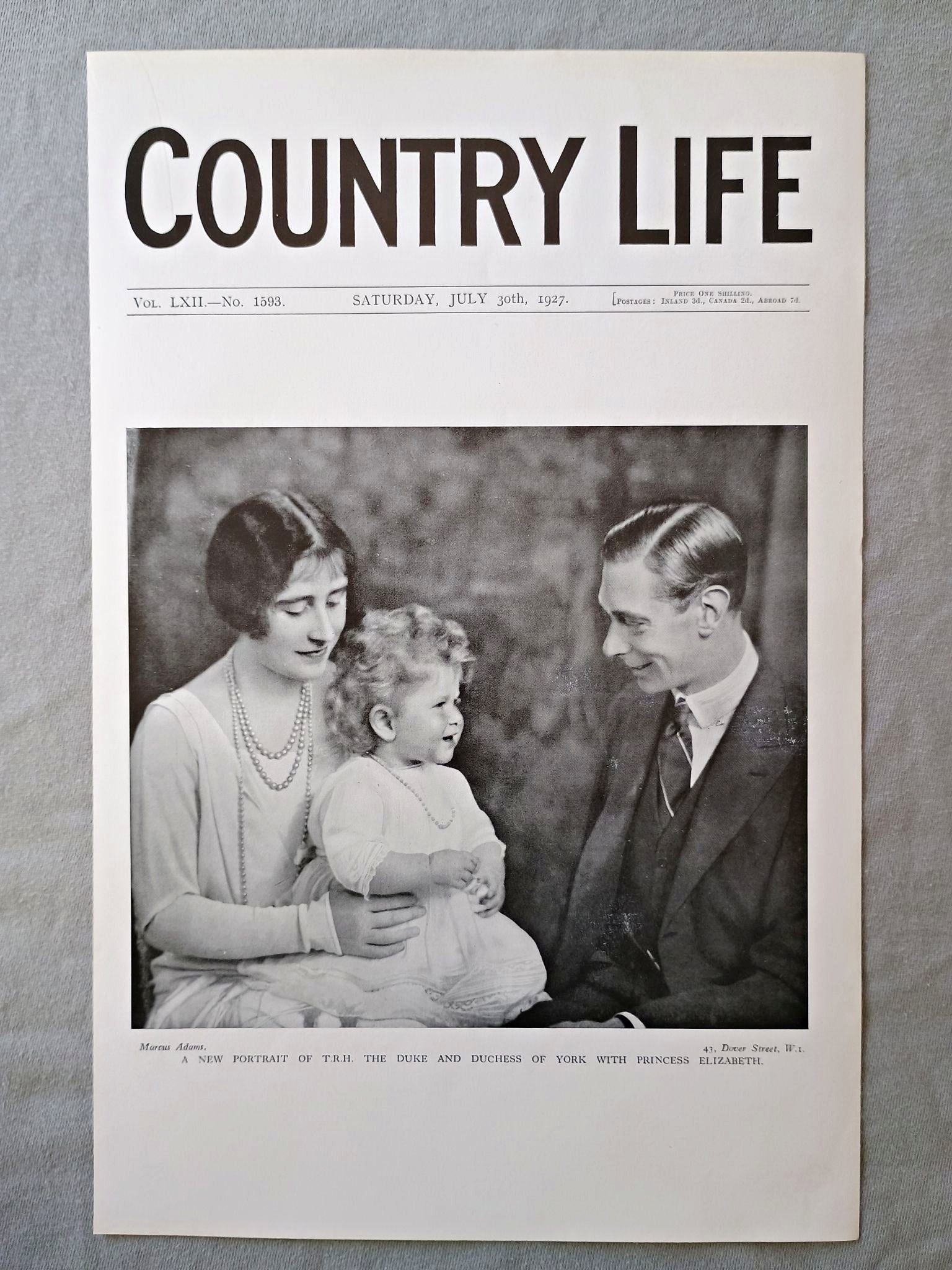 The Duke and Duchess of York, Princess Elizabeth Country Life Magazine Portrait, Frontispiece, July 30 1927. LXII No. 1593

The featured frontispiece this week shows a portrait of T.R.H. The Duke and Duchess of York and Princess Elizabeth