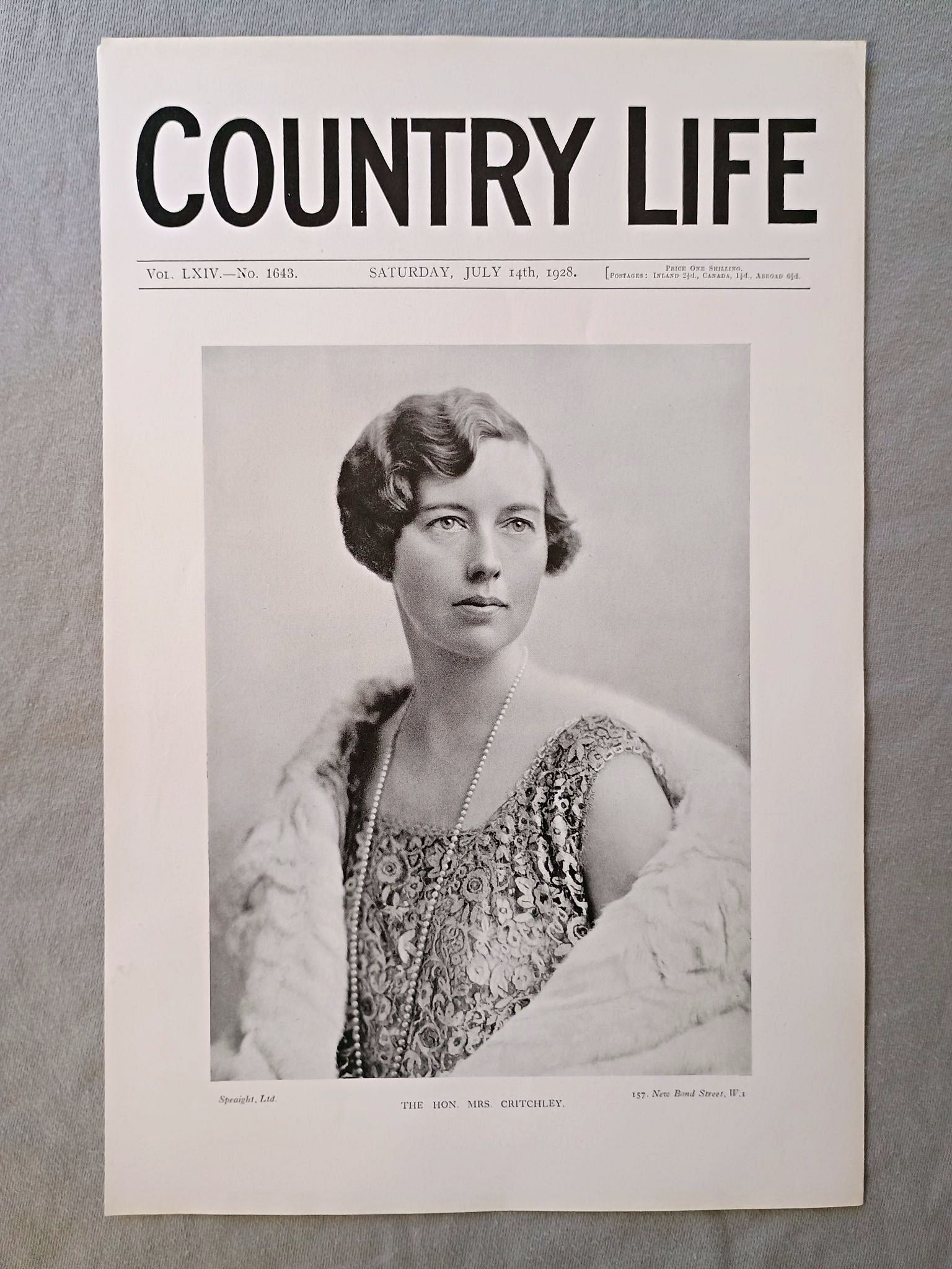 Mrs Critchley nee Eleanor Gladys Waring Country Life Magazine Portrait, Frontispiece, July 14 1928. LXIV No. 1643

The featured frontispiece this week is a portrait of the Hon. Mrs. Critchley, who is the only child of Lord and Lady Waring