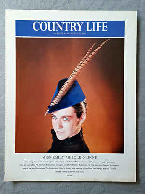 Miss Emily Mercer Nairne, daughter of Lord and Lady Robert Mercer Nairne, of Meikleour House, Perthshire, is to be married to Mr Dominic Robertson, youngest son of Mr Nander Robertson, of The Garrique, Kippen, Stirlingshire, and of the late Honourable Mrs Robertson. Emily is shown here wearing a hat of her own design, and has recently started trading as Amble and Strut