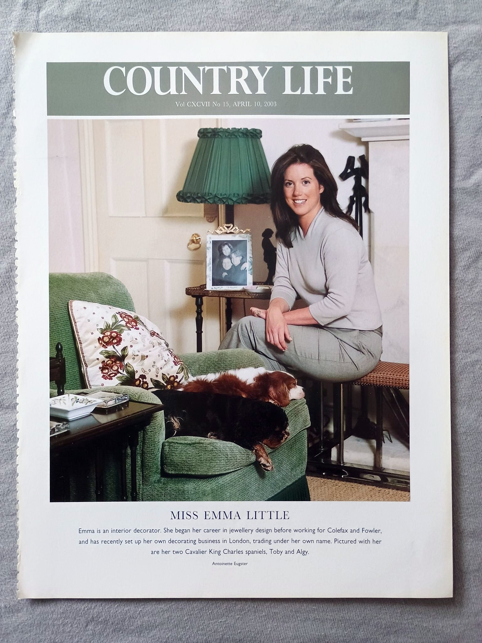 Miss Emma Little - Emma is an interior decorator. She began her career in jewellery design before working for Colefax and Fowler, and has recently set up her own decorating business in London, trading under her own name. Pictured with her are her two Cavalier King Charles spaniels, Toby and Algy