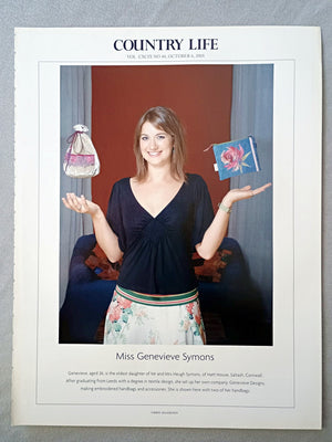Miss Genevieve Symons - Genevieve, aged 26, is the eldest daughter of Mr and Mrs Heugh Symons, of Hatt House, Saltash, Cornwall. After graduating from Leeds with a degree in textile design, she set up her own company, Genevieve Designs, making embroidered handbags and accessories. She is shown here with two of her handbags.