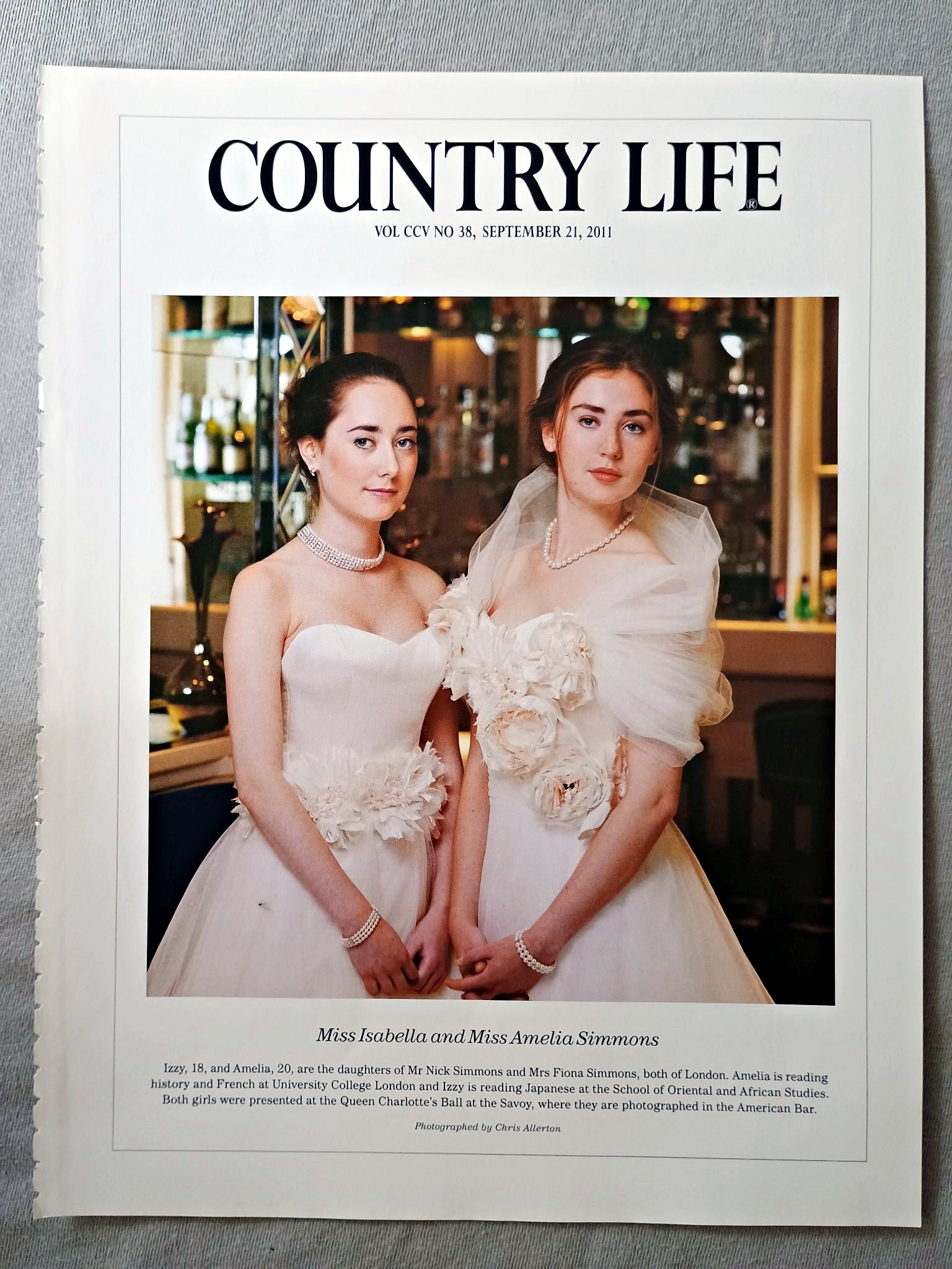 Miss Isabella and Miss Amelia Simmons - Izzy, 18, and Amelia, 20, are the daughters of Mr Nick Simmons and Mrs Fiona Simmons, both of London. Amelia is reading history and French at University College London and Izzy is reading Japanese at the School of Oriental and African Studies. Both girls were presented at the Queen Charlotte's Ball at the Savoy, where they are photographed in the American Bar.